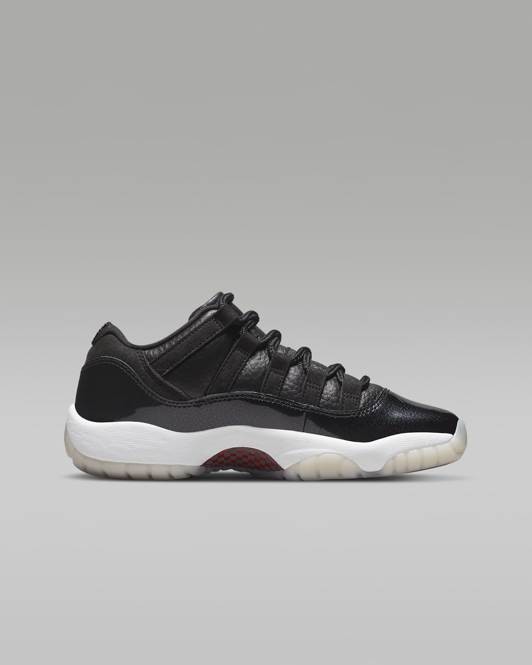 Air Jordan 11 Retro Low Older Kids' Shoes. Nike LU