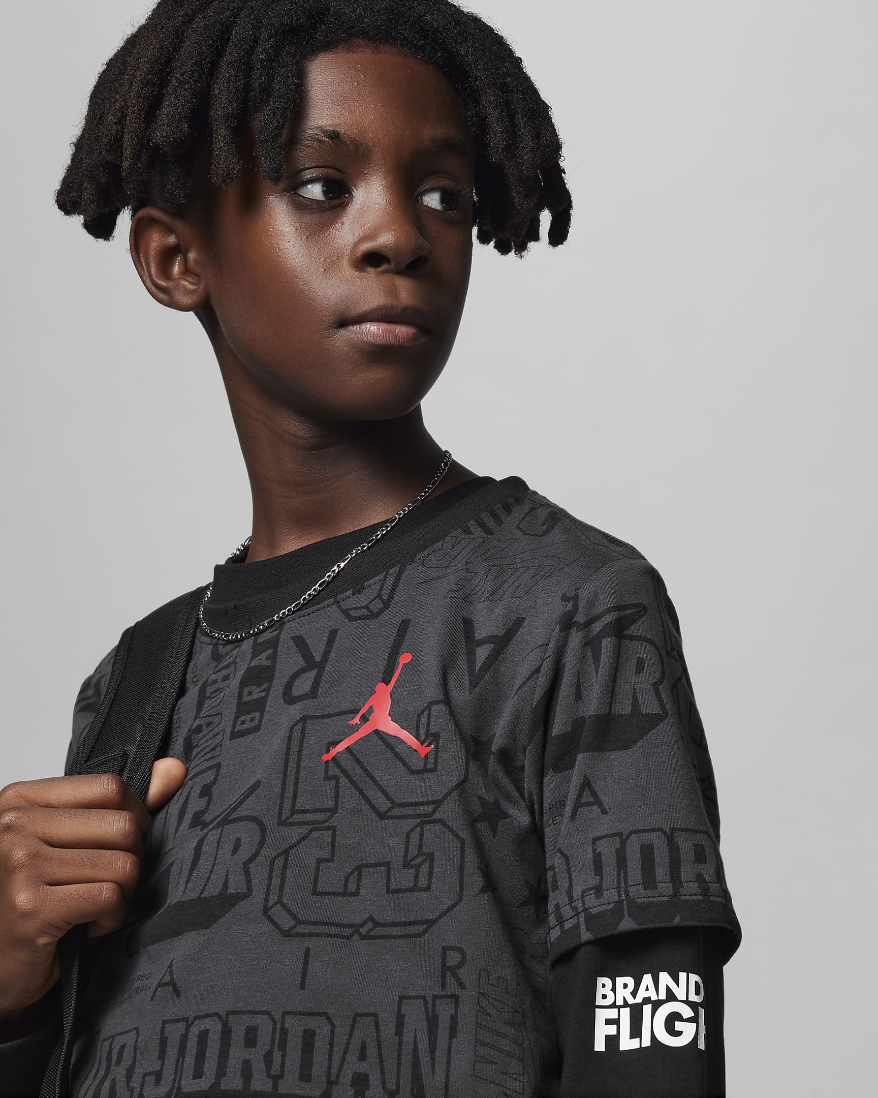 Jordan Wall of Flight Tee Older Kids' T-Shirt. Nike PT