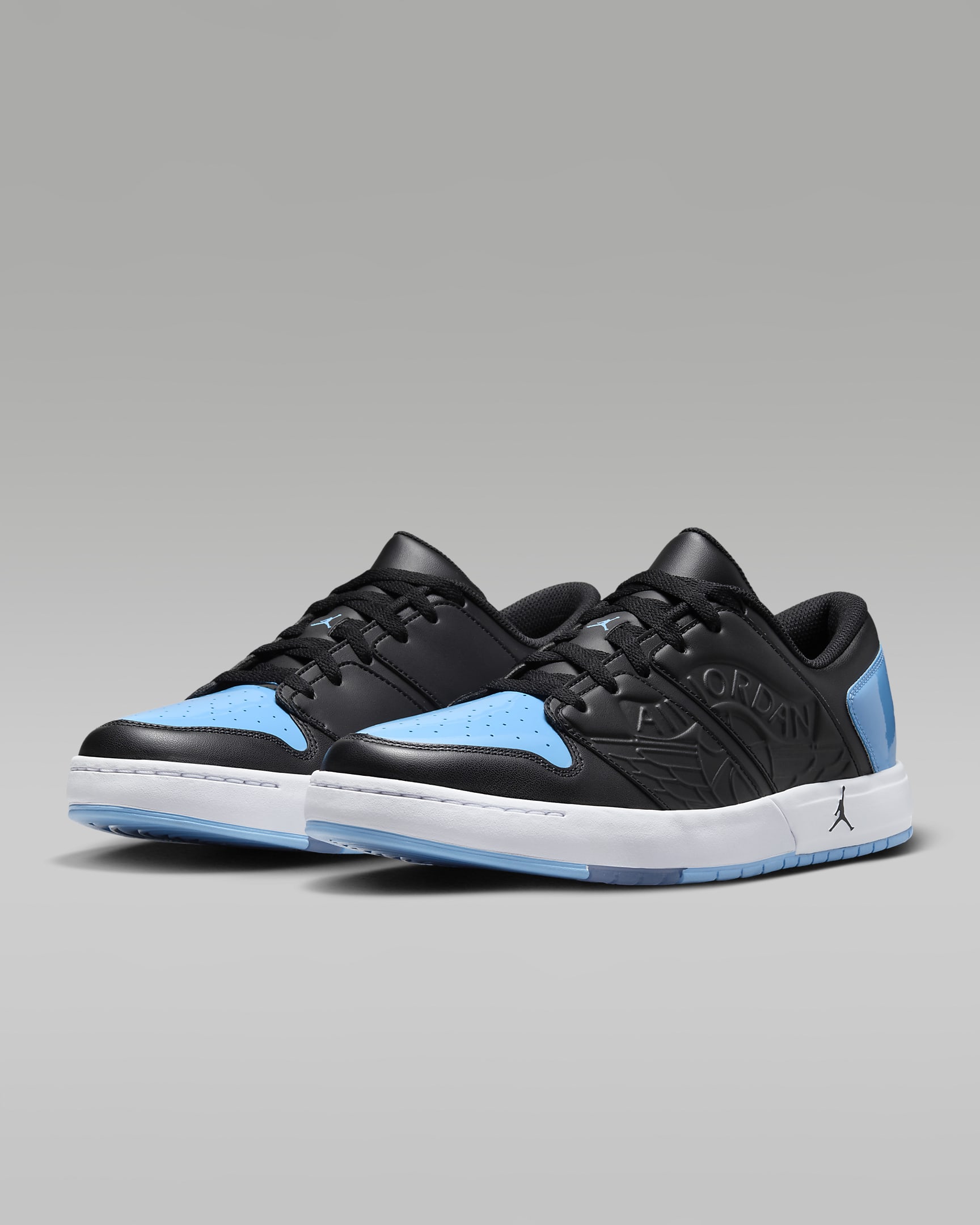 Jordan Nu Retro 1 Low Men's Shoes - Black/White/Football Grey/University Blue