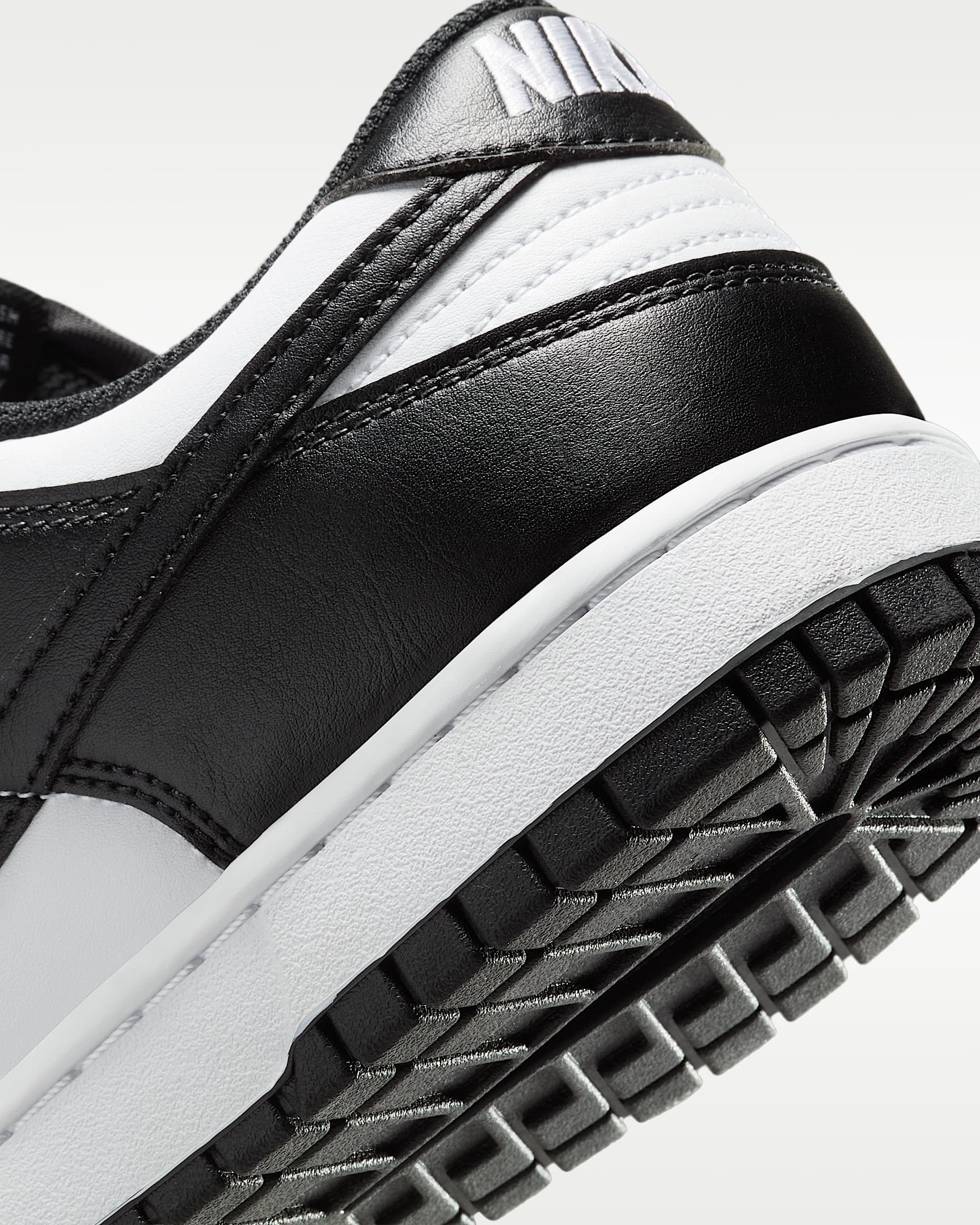 Nike Dunk Low Retro Men's Shoes - White/White/Black