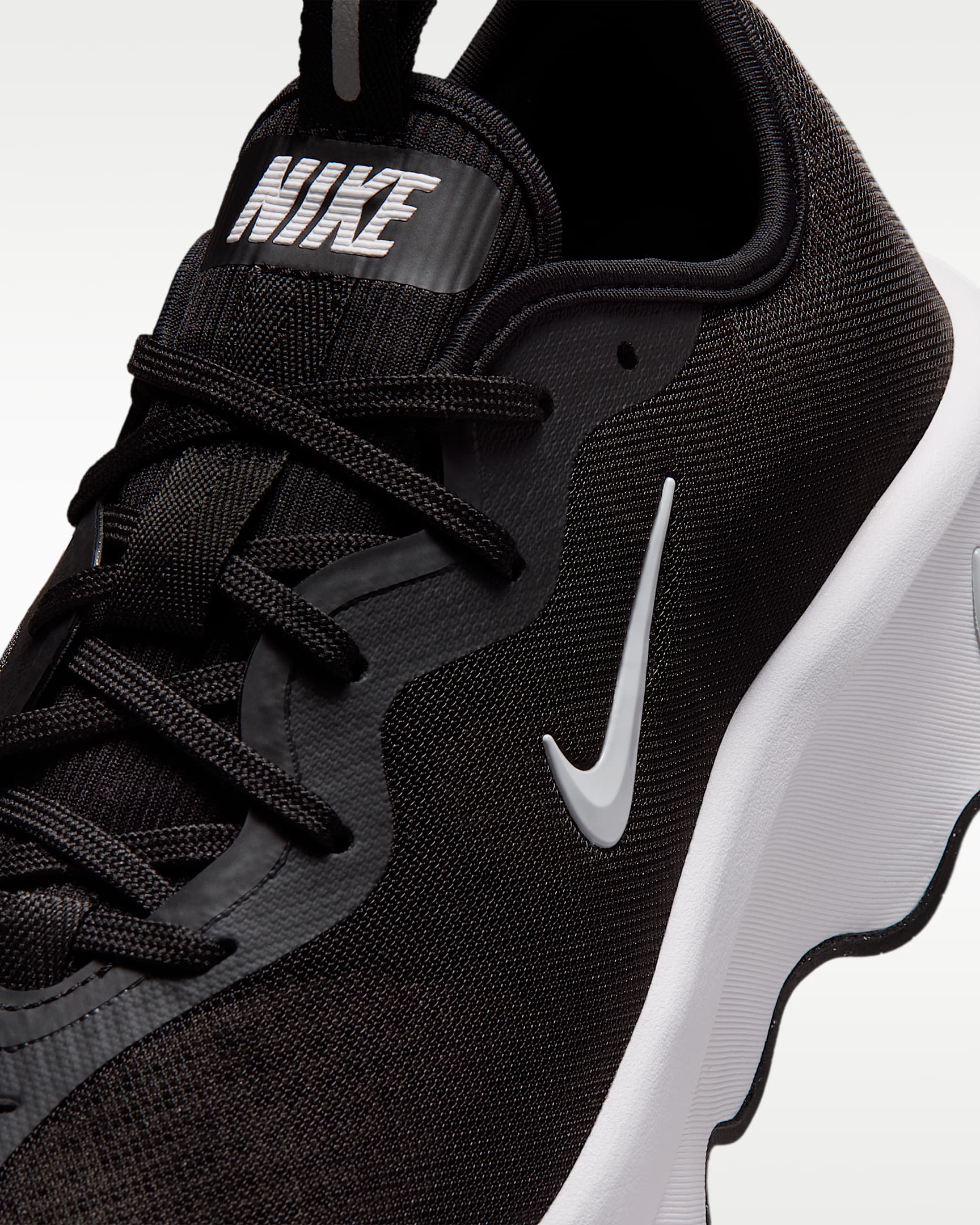 รองเท้าเดินผู้หญิง Nike Motiva 2 - ดำ/Pure Platinum/ขาว