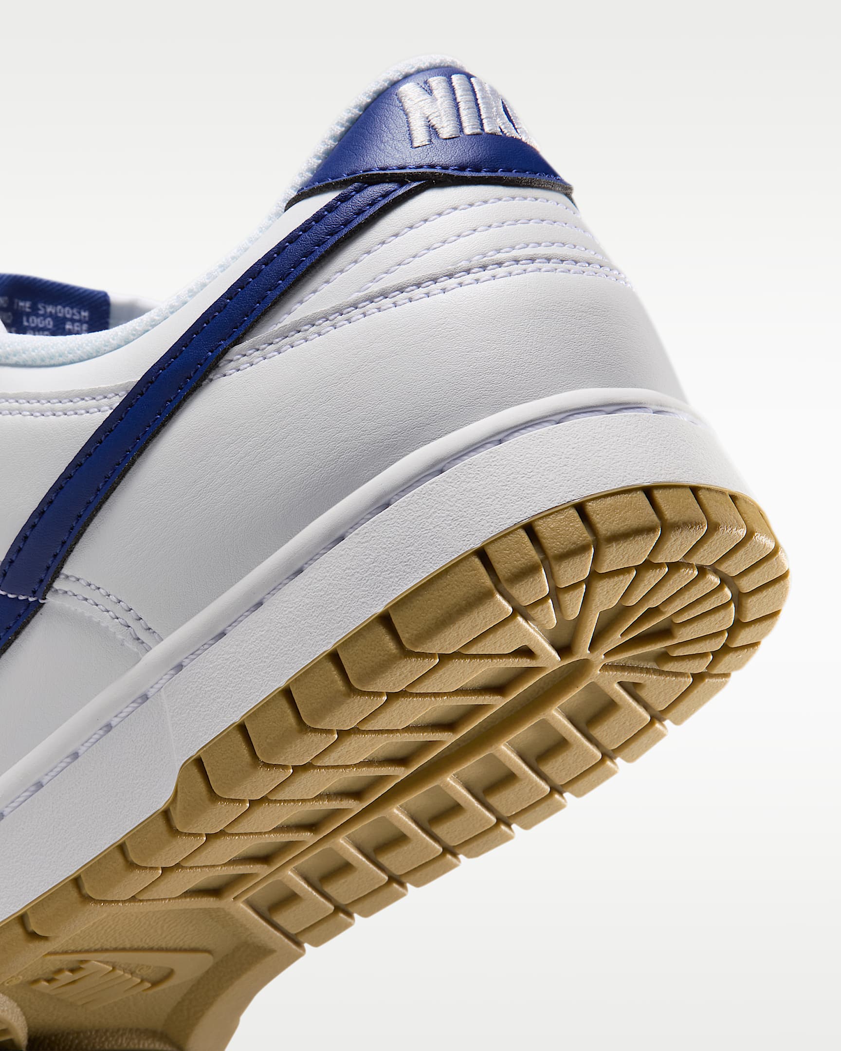 Nike Dunk Low Retro Men's Shoes - White/Gum Light Brown/Deep Royal Blue