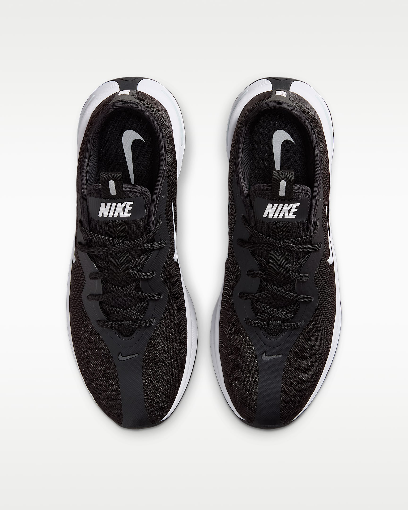 รองเท้าเดินผู้หญิง Nike Motiva 2 - ดำ/Pure Platinum/ขาว
