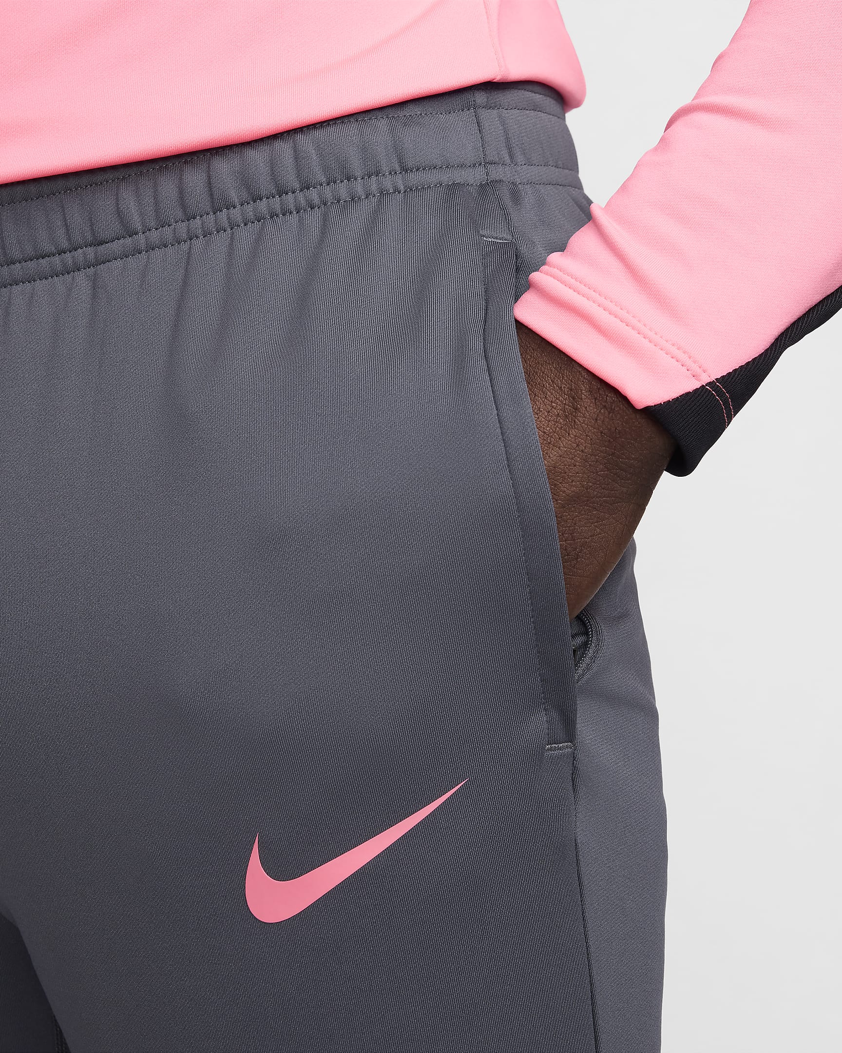 Pantalon de foot Dri-FIT Nike Strike pour homme - Iron Grey/Iron Grey/Noir/Sunset Pulse