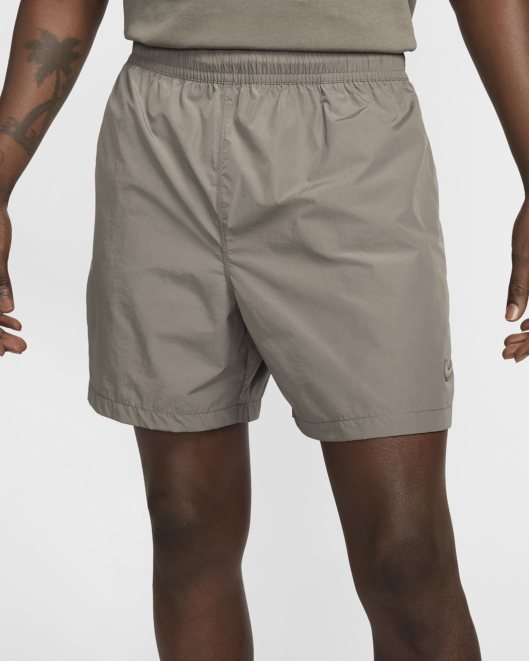 Shorts de nylon NOCTA Cardinal - Gris oliva/Fósil lunar/Fósil lunar