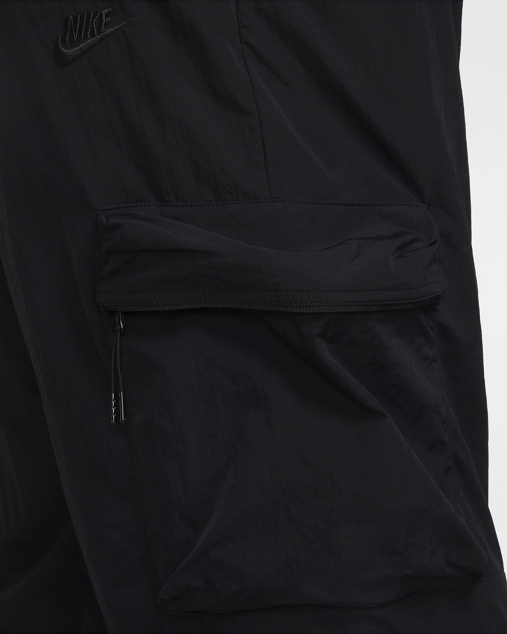 Pantaloni cargo in tessuto Nike Tech – Uomo - Nero/Nero