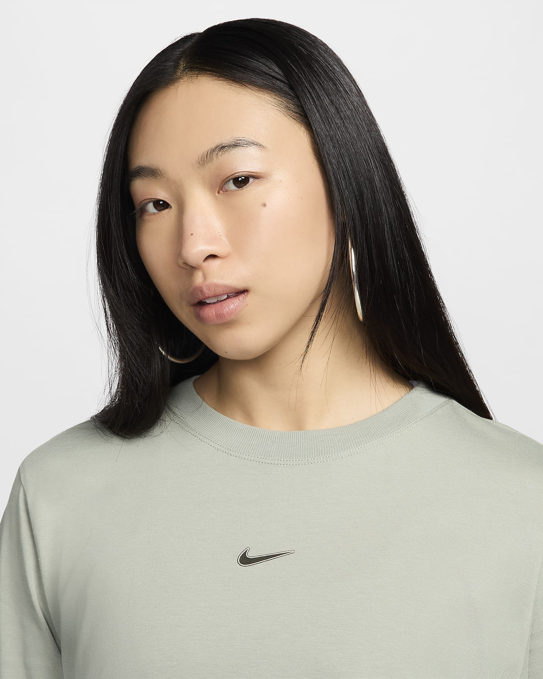 เสื้อยืดแขนยาวทรงหลวมผู้หญิง Nike Sportswear - Jade Horizon