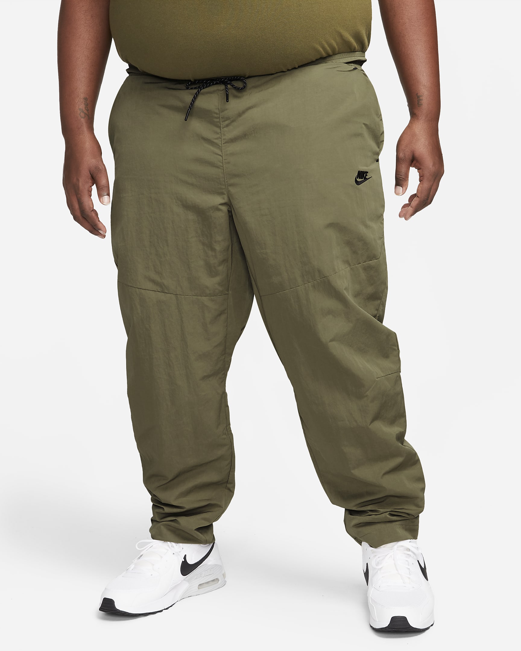 Nike Sportswear Tech Essentials Men's lined Commuter Pants.