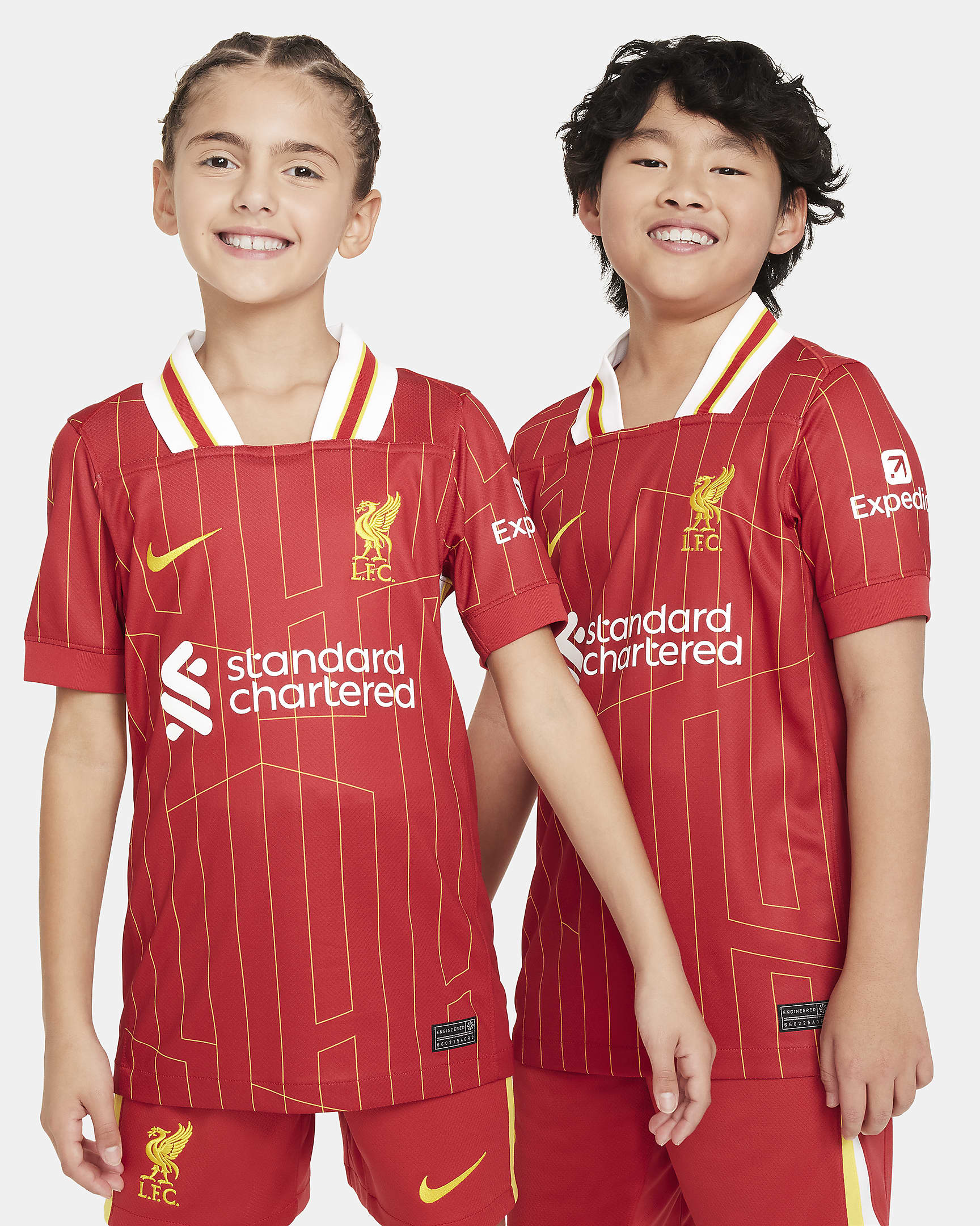 Koszulka piłkarska dla dużych dzieci Nike Dri-FIT Liverpool F.C. Stadium 2024/25 (wersja domowa) – replika - Gym Red/Biel/Chrome Yellow