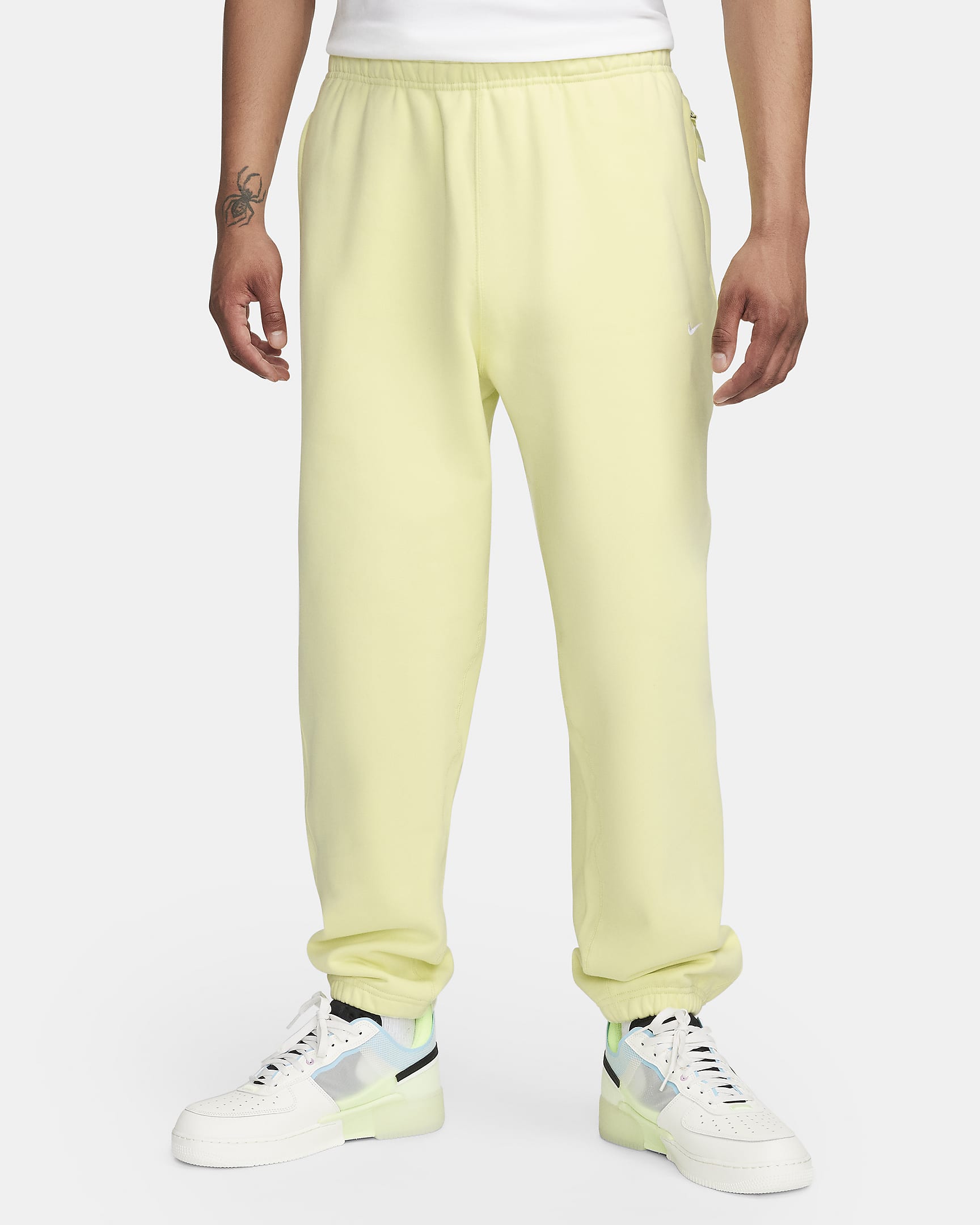 Pants de tejido Fleece para hombre Nike Solo Swoosh - Verde luminoso/Blanco