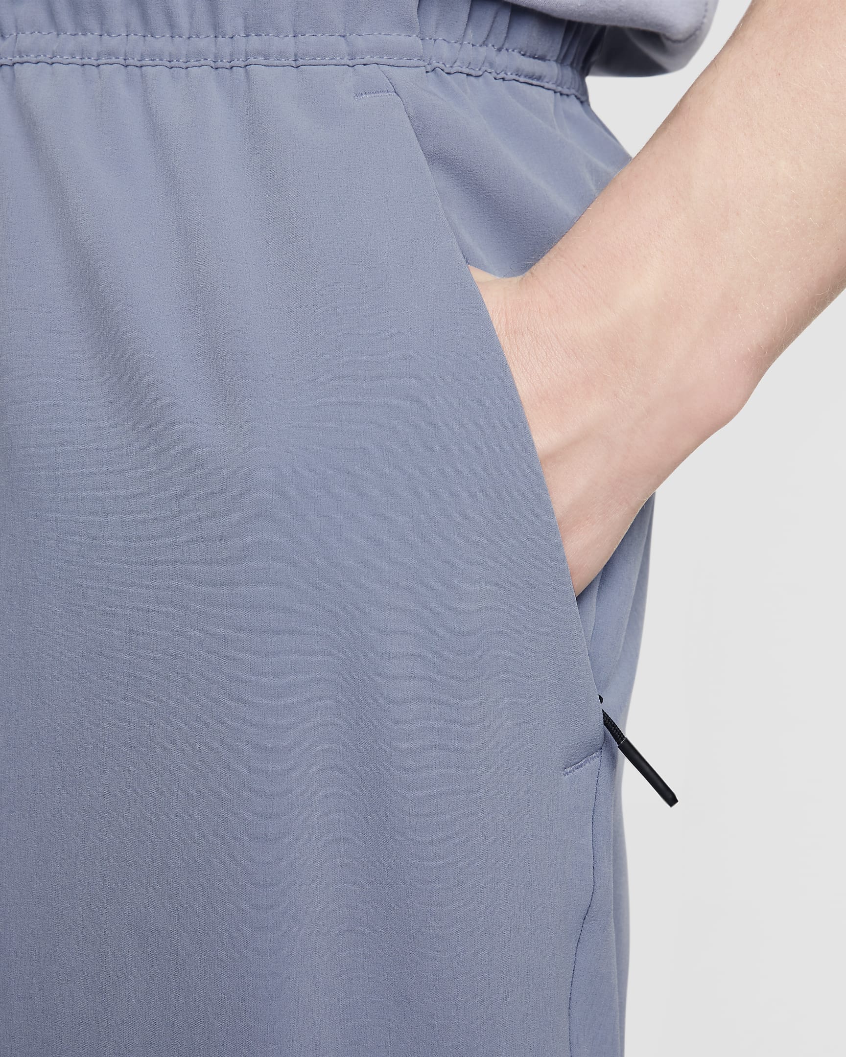 mens nike pants with zipper pockets