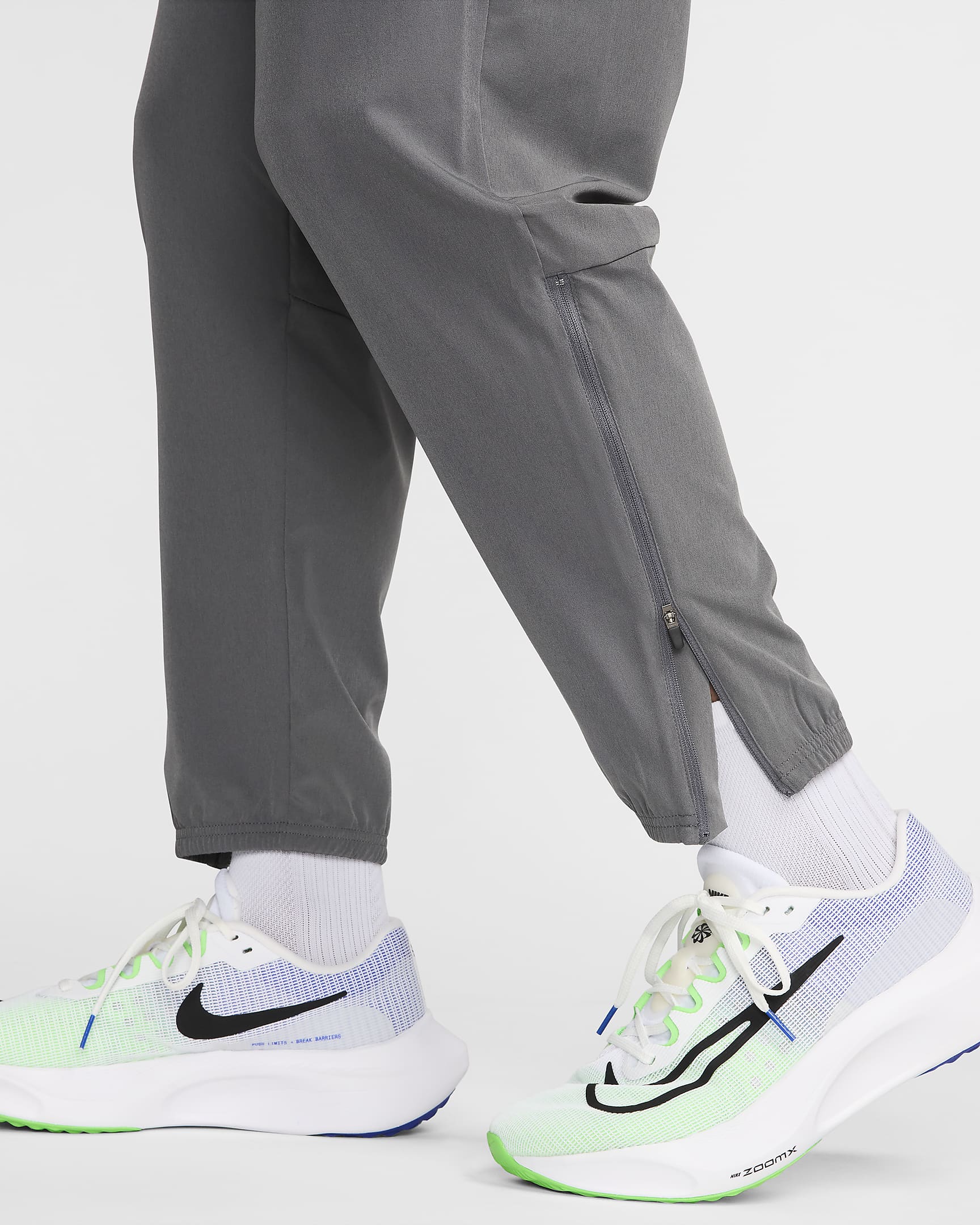 Pantaloni da running Nike Challenger – Uomo - Iron Grey