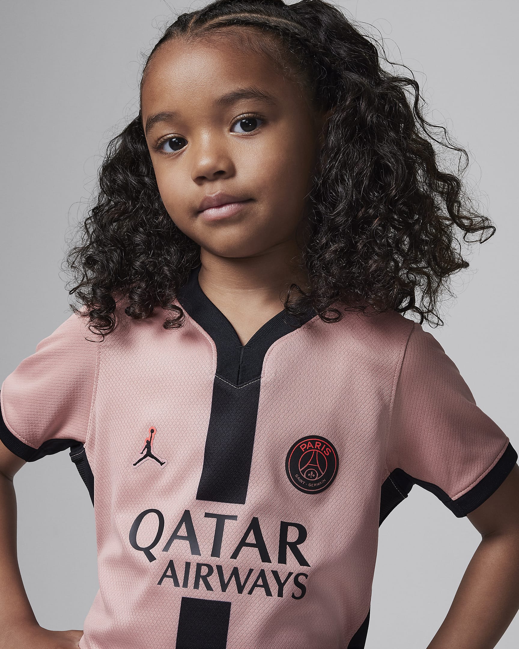 Paris Saint-Germain 2024/25 Stadium Third Younger Kids' Jordan Football Replica Three-Piece Kit - Rust Pink/Black/Black