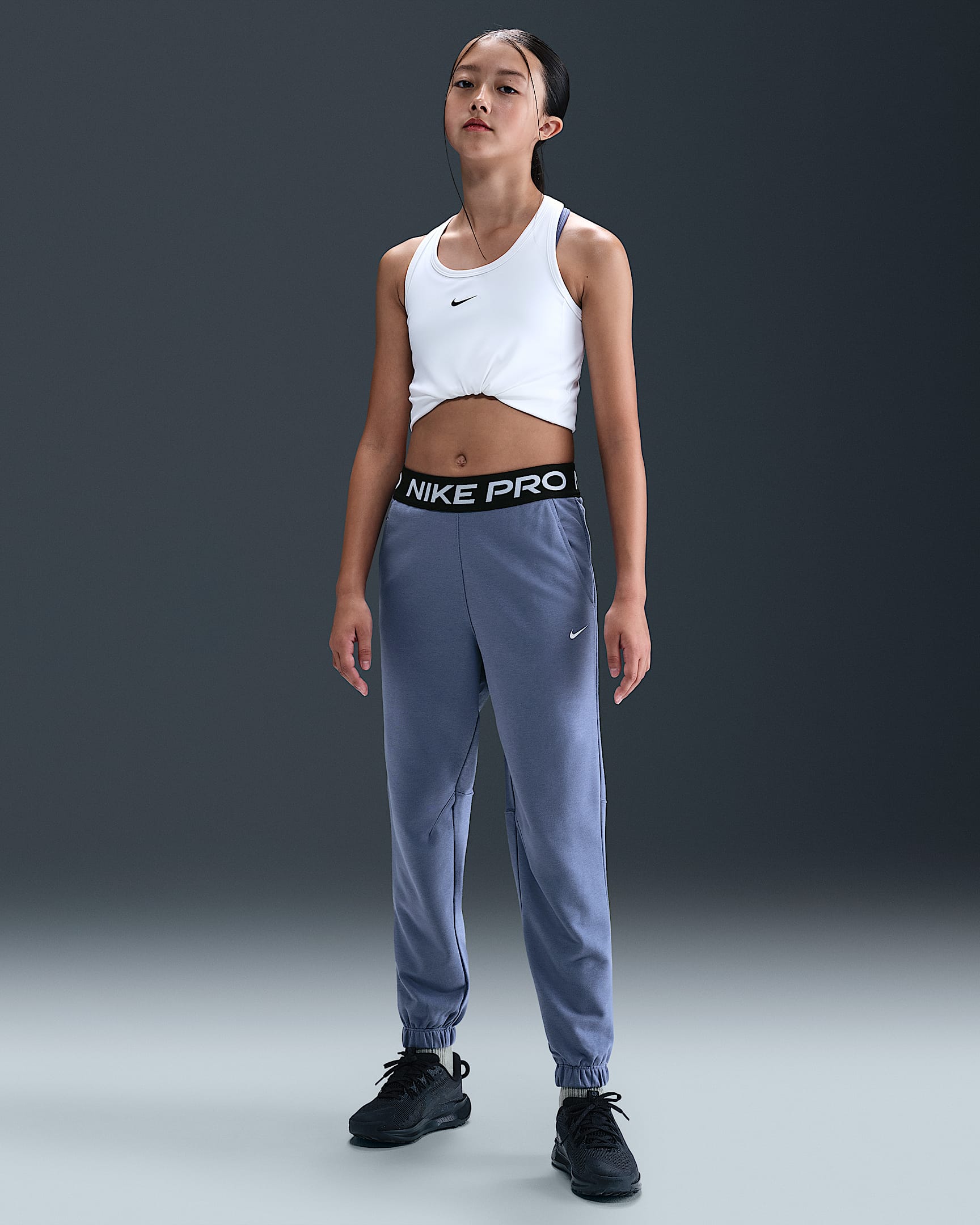 Nike Pro Fleece Dri-FIT szabadidőnadrág nagyobb gyerekeknek (lányok) - World Indigo/World Indigo/Fekete/Fehér