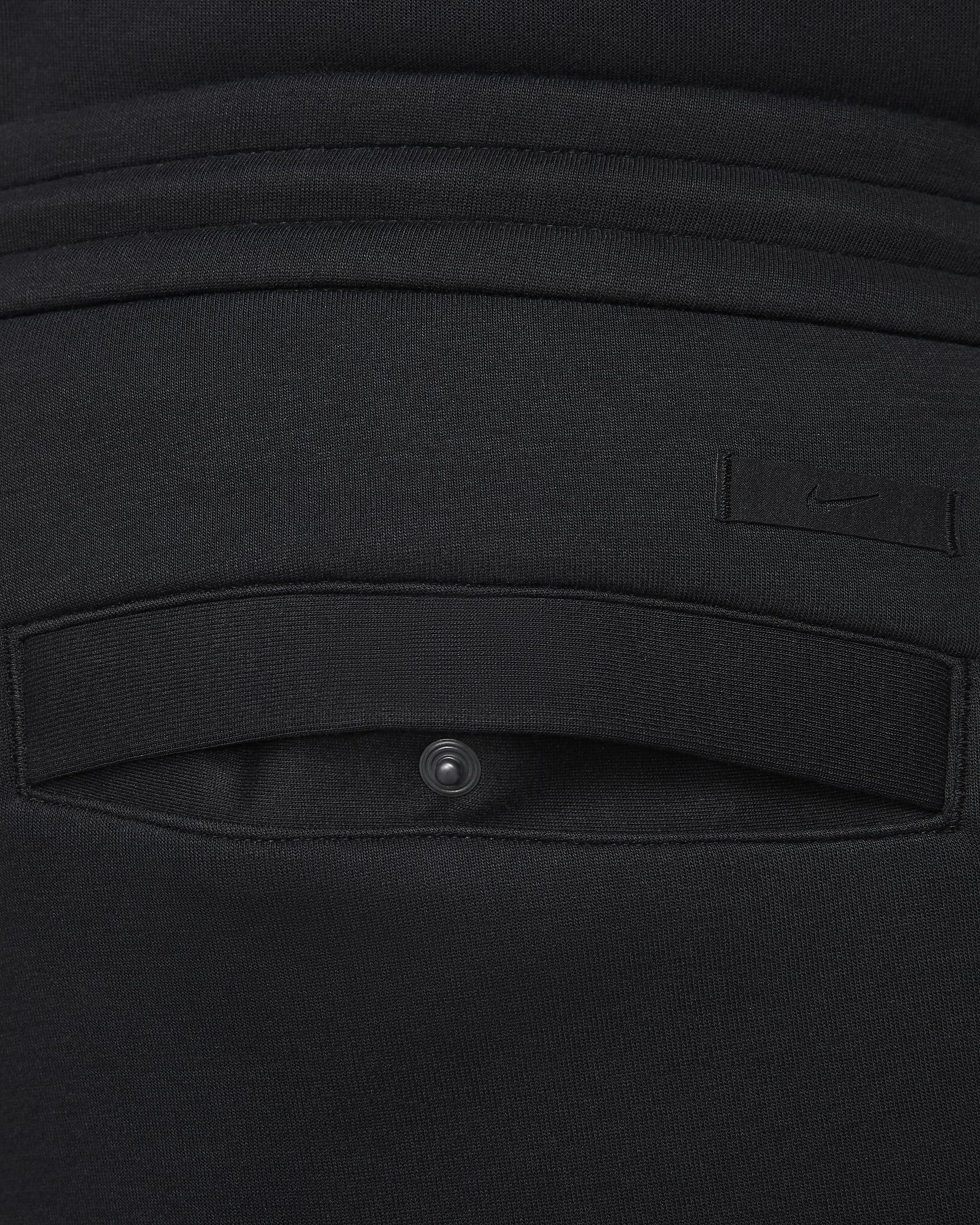 Pantalon de survêtement ample à ourlet ouvert Nike Sportswear Tech Fleece Reimagined pour homme - Noir/Noir