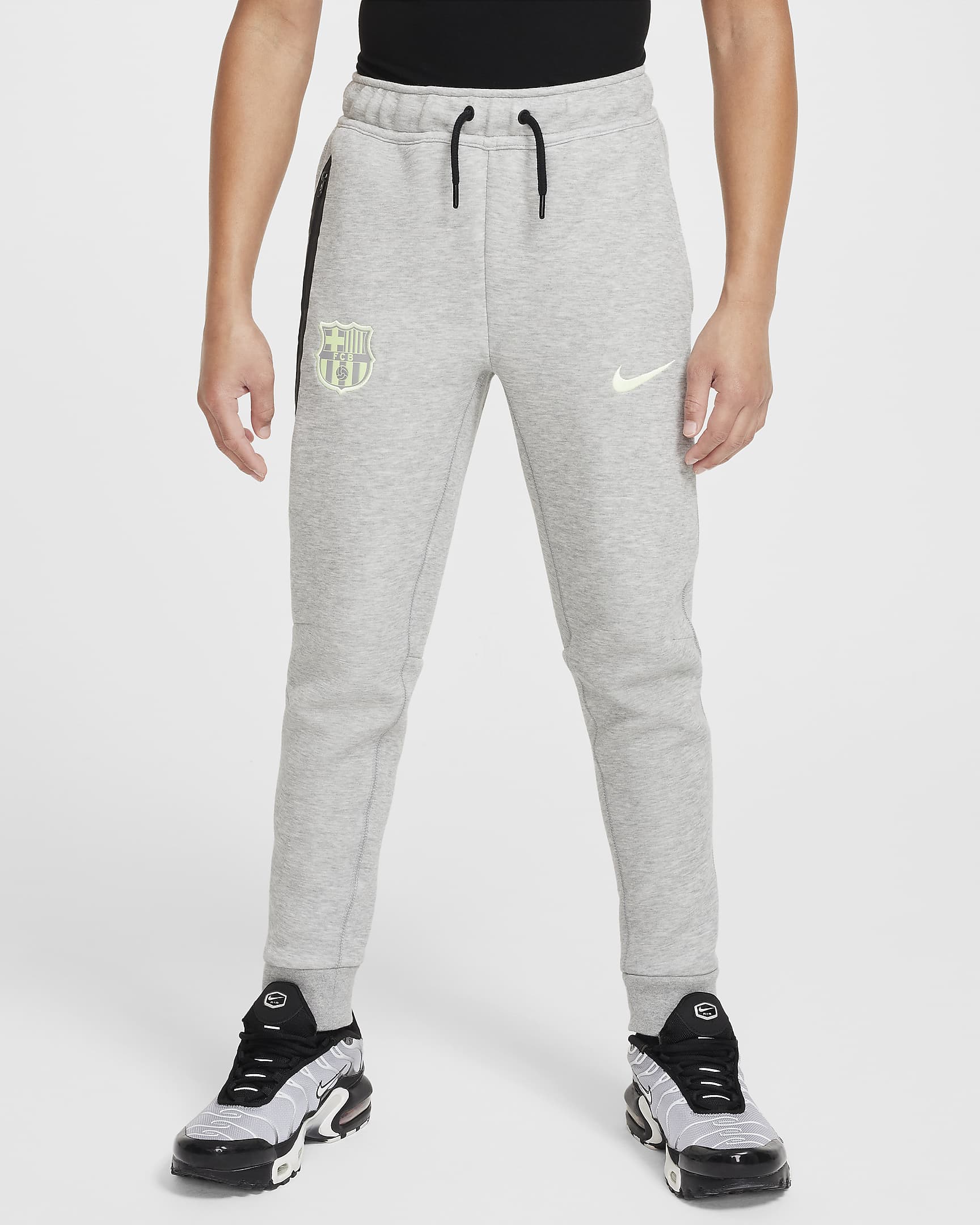 Spodnie piłkarskie dla dużych dzieci (chłopców) Nike FC Barcelona Tech Fleece - Dark Grey Heather/Barely Volt