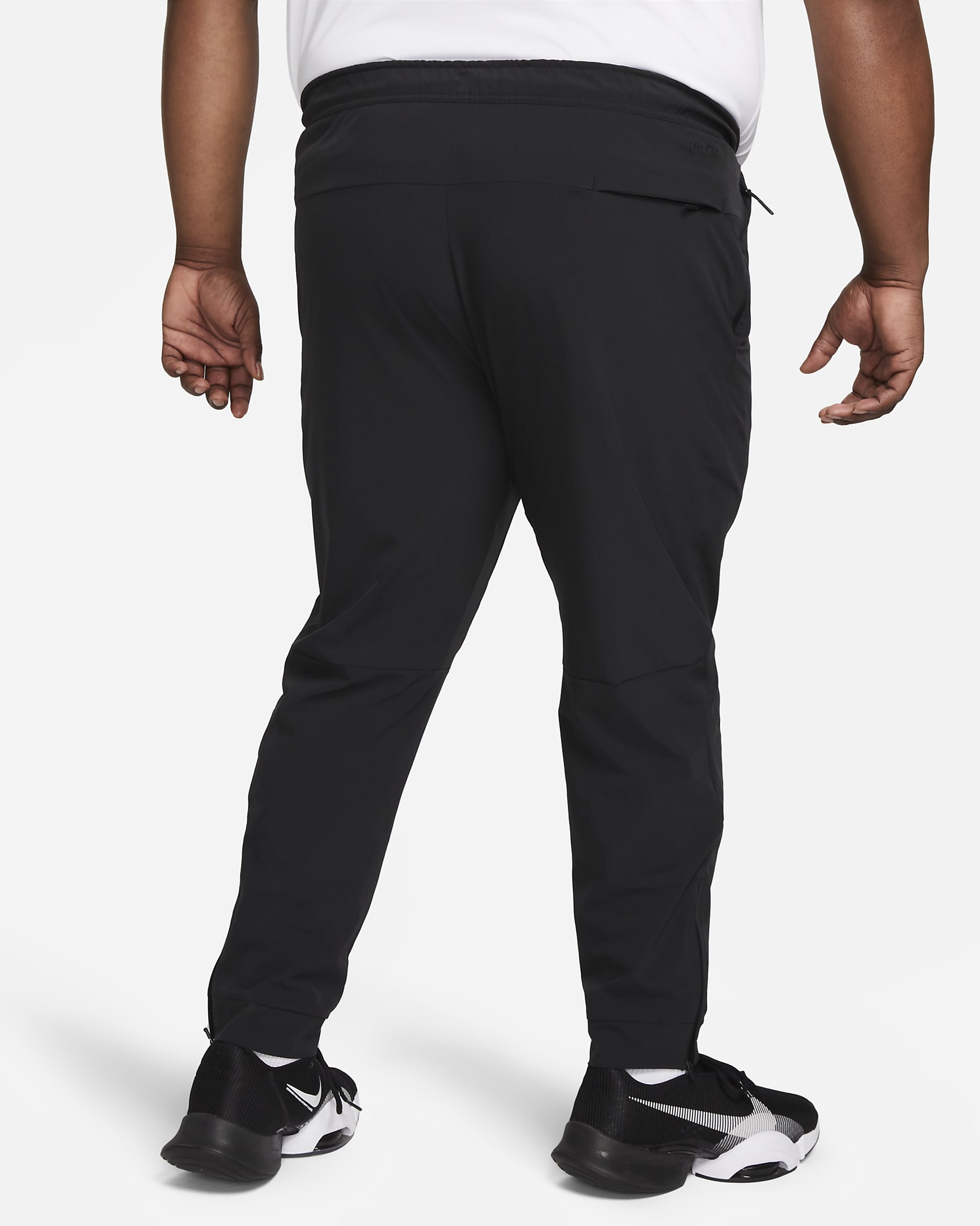 Nike Unlimited Men's Dri-FIT Zip Cuff Versatile Trousers - Black/Black/Black