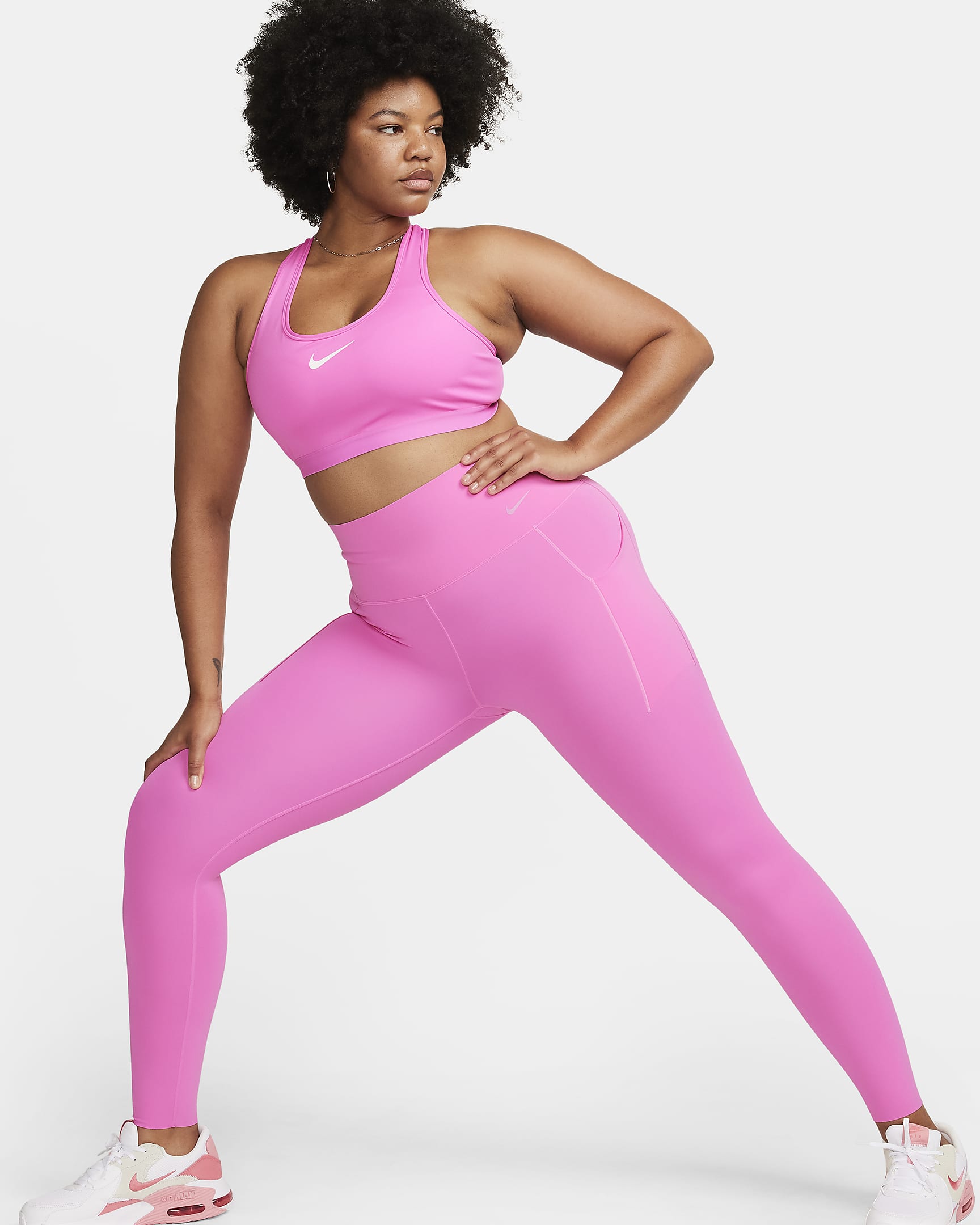 Legging long taille haute à maintien normal avec poches Nike Universa pour femme - Playful Pink/Noir