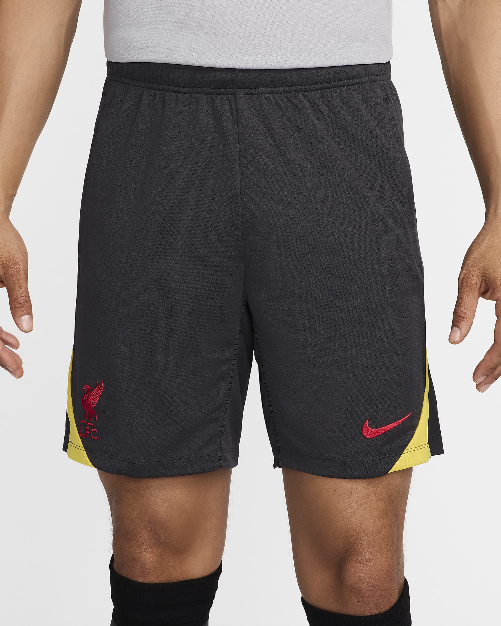 Męskie spodenki piłkarskie z dzianiny Nike Dri-FIT Liverpool F.C. Strike (wersja trzecia) - Dark Smoke Grey/Chrome Yellow/Global Red