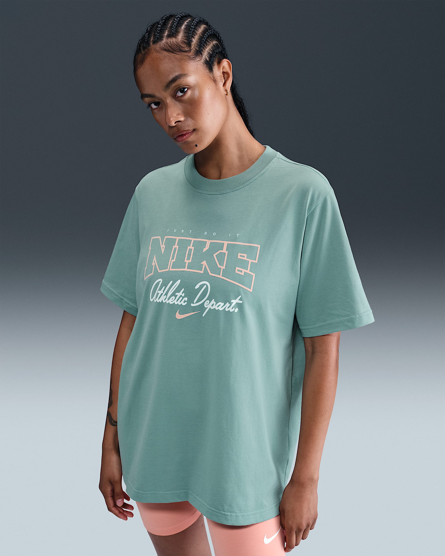 Nike Sportswear Women's Loose Short-Sleeve Graphic T-Shirt - Cannon