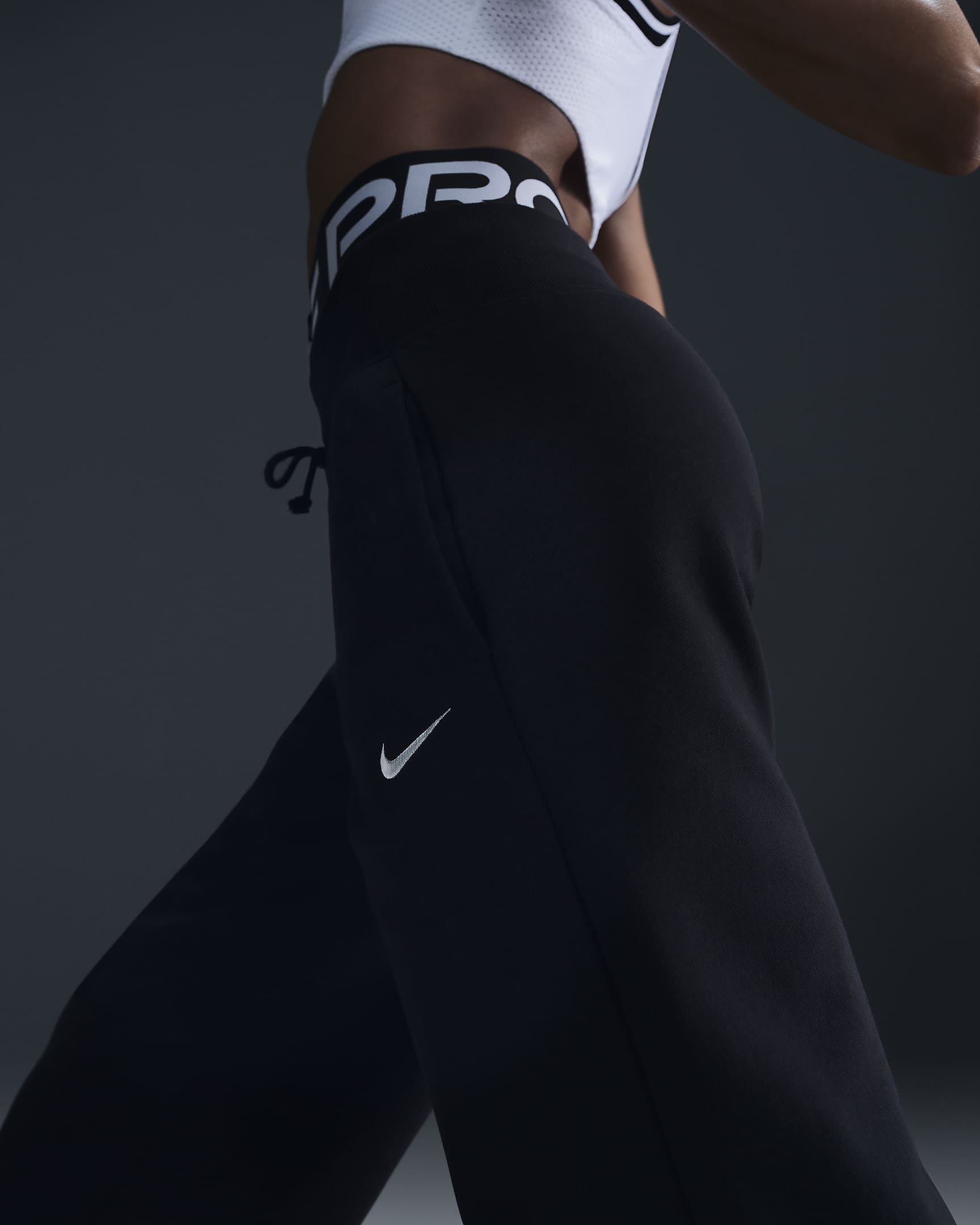 Pantalon de survêtement ample à taille haute Nike Sportswear Phoenix Fleece pour Femme - Noir/Sail