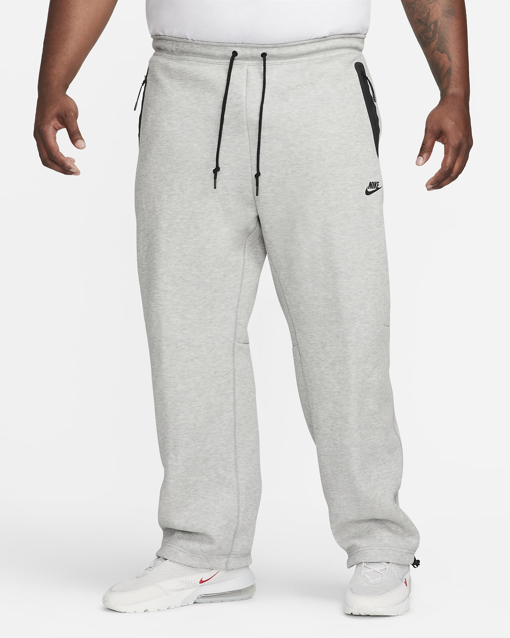 Pantalon de survêtement à ourlet ouvert Nike Sportswear Tech Fleece pour homme - Dark Grey Heather/Noir