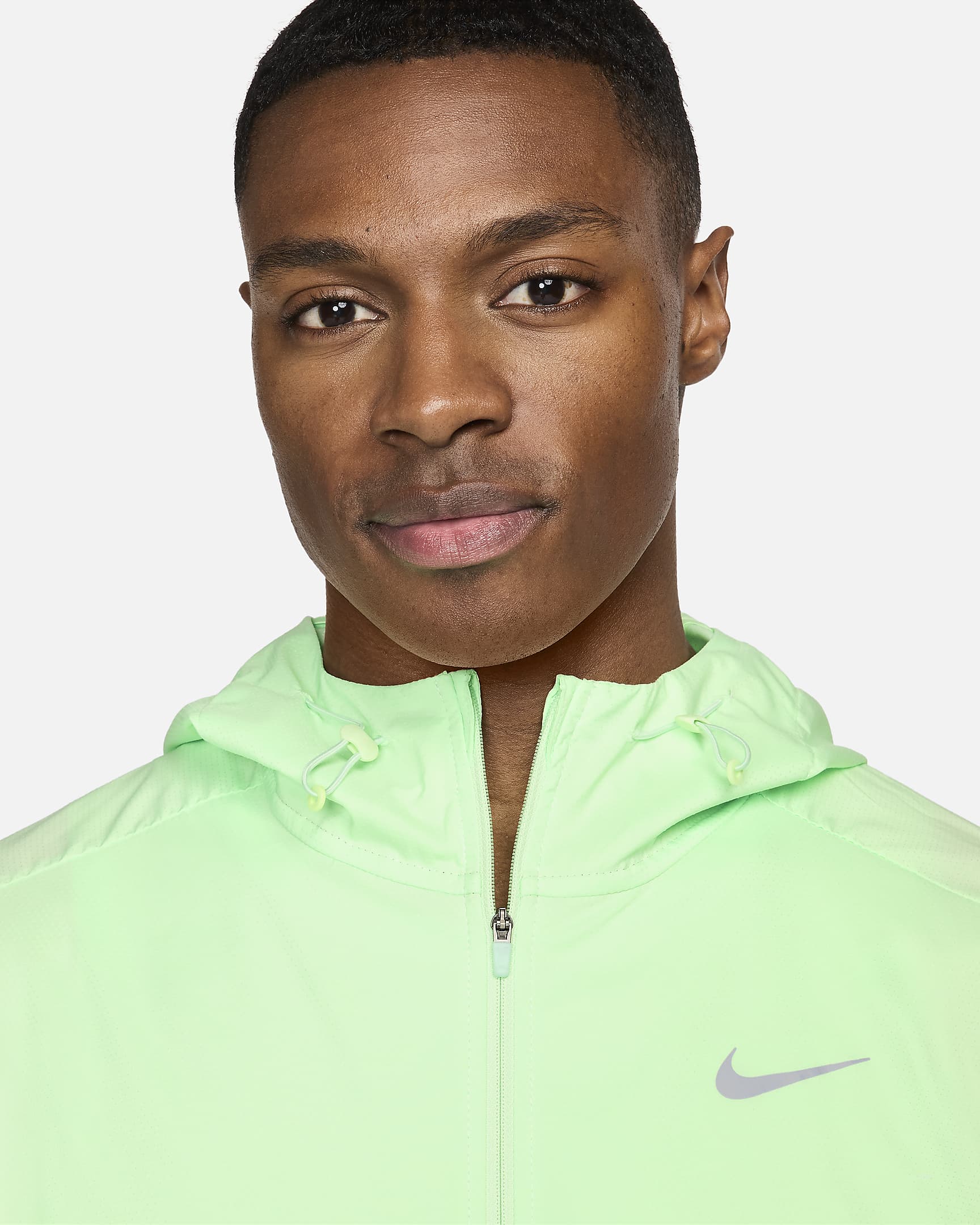 Chamarra de correr Repel para hombre Nike Windrunner - Verde vapor/Mena de hierro claro