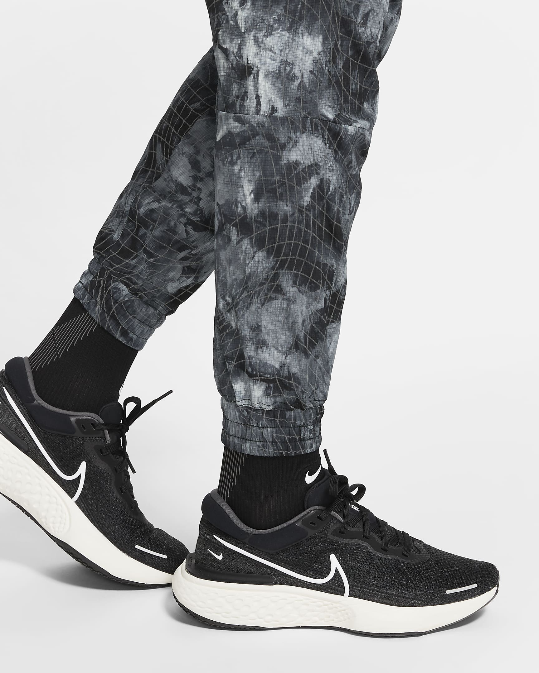 Nike NSRL Men's Packable Trousers. Nike NO