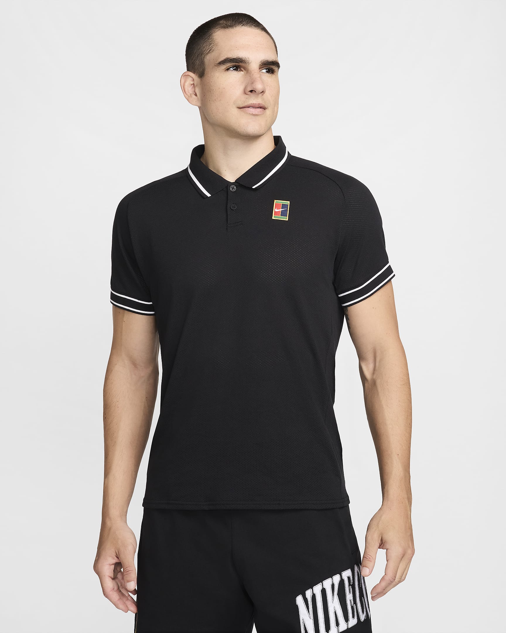 NikeCourt Heritage Tennispolo voor heren - Zwart/Wit