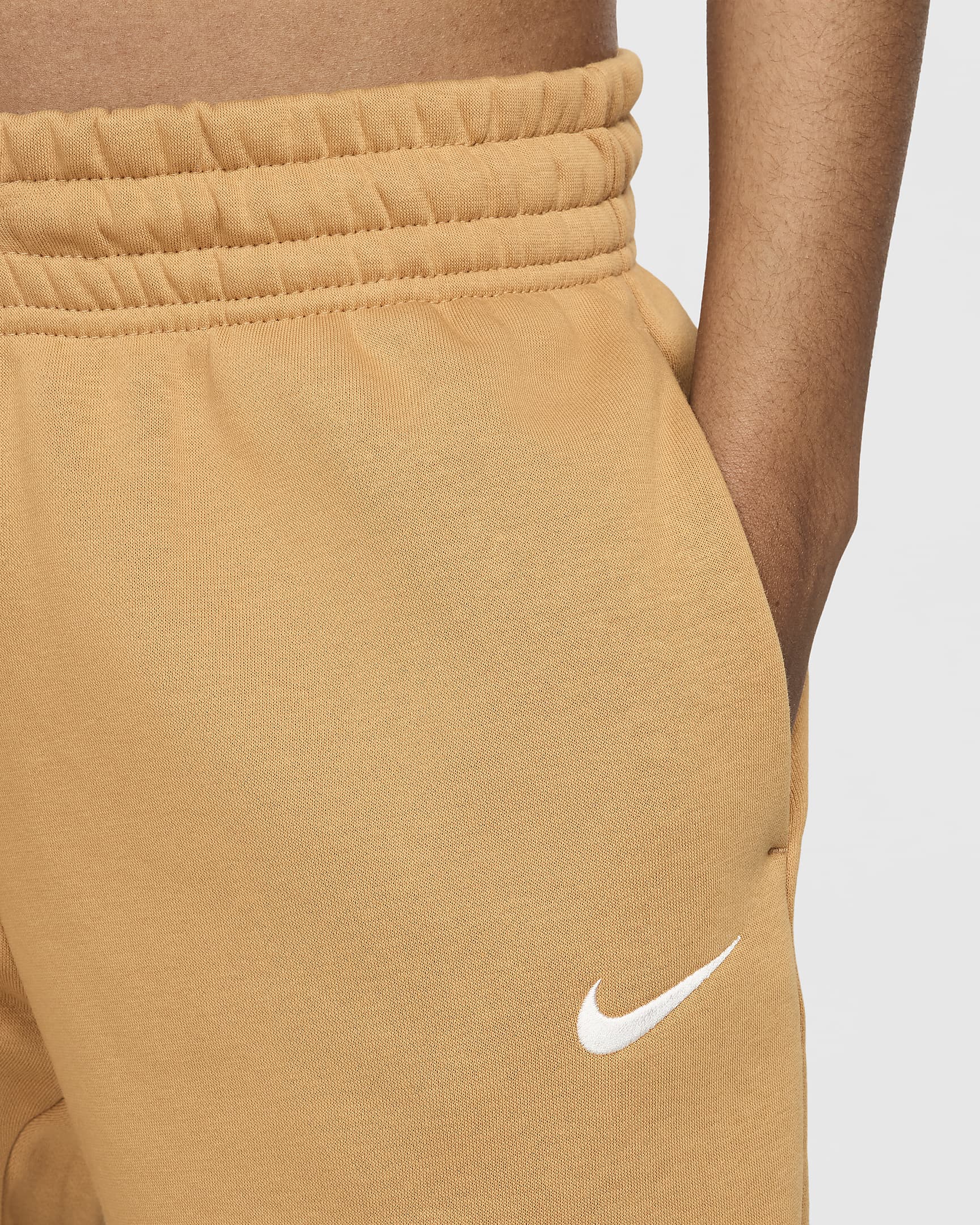 Pants de entrenamiento de tiro medio para mujer Nike Sportswear Phoenix Fleece - Lino/Vela