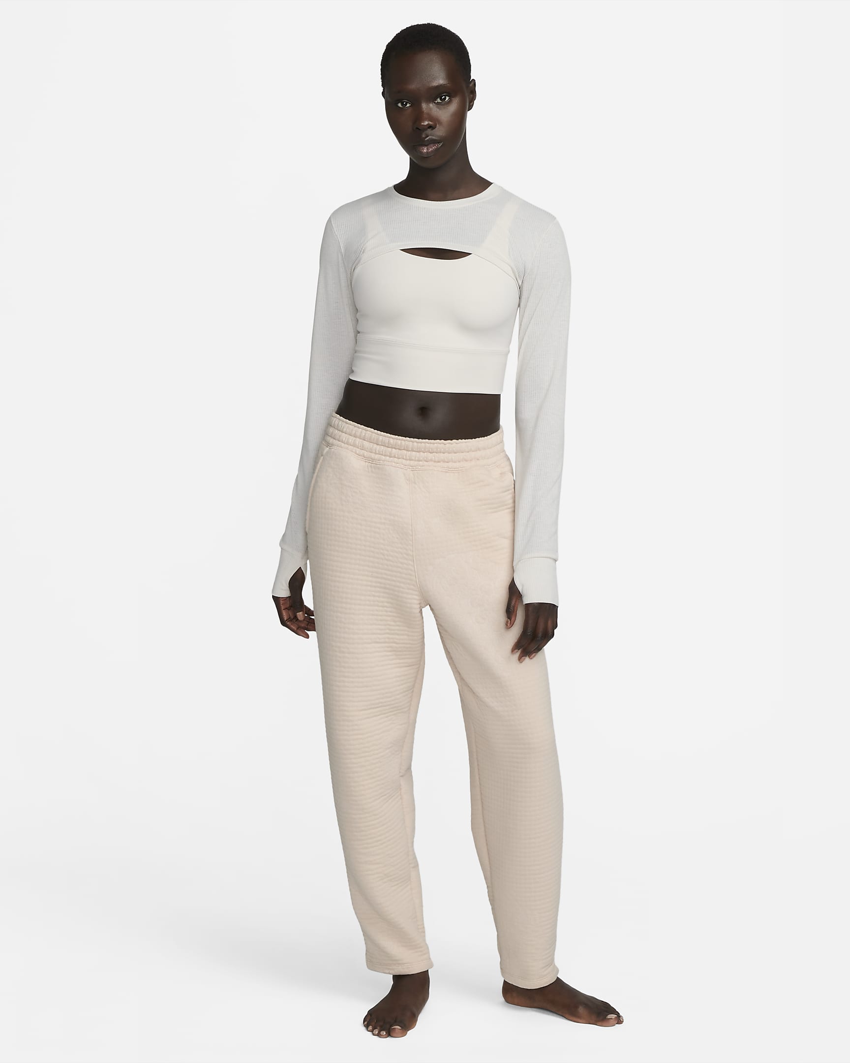 Top corto de manga larga para mujer Nike Yoga Luxe.