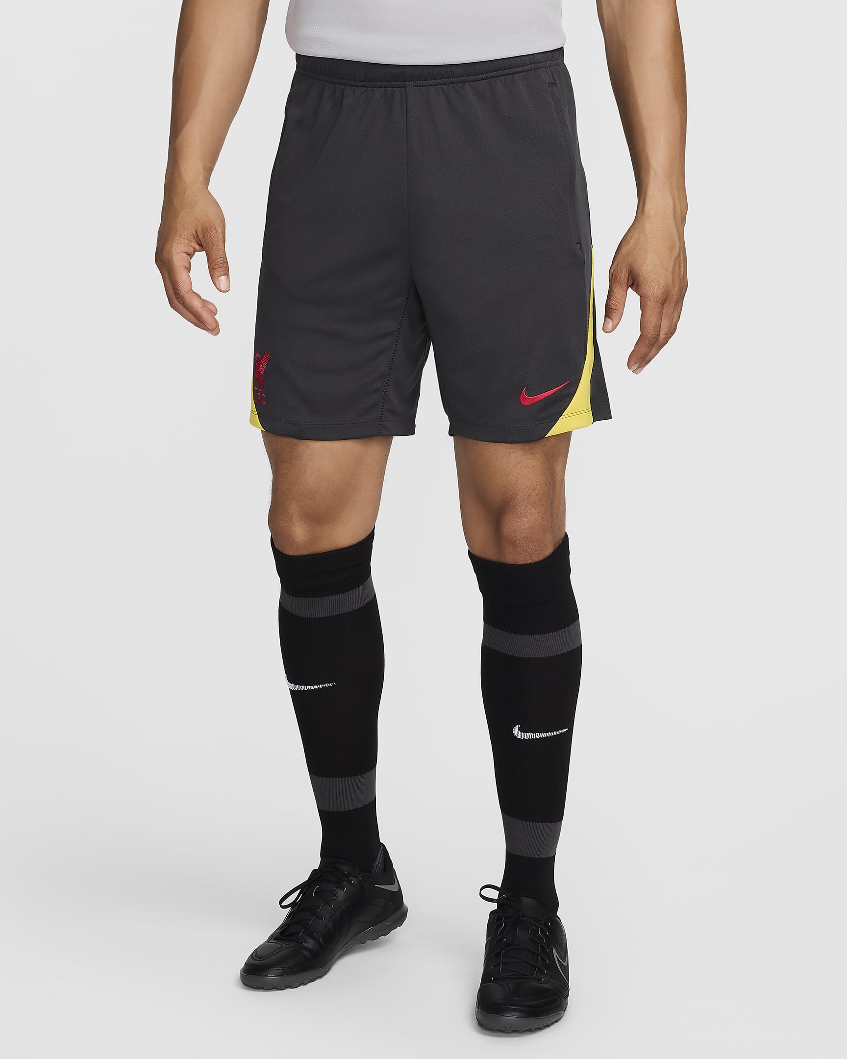 Męskie spodenki piłkarskie z dzianiny Nike Dri-FIT Liverpool F.C. Strike (wersja trzecia) - Dark Smoke Grey/Chrome Yellow/Global Red