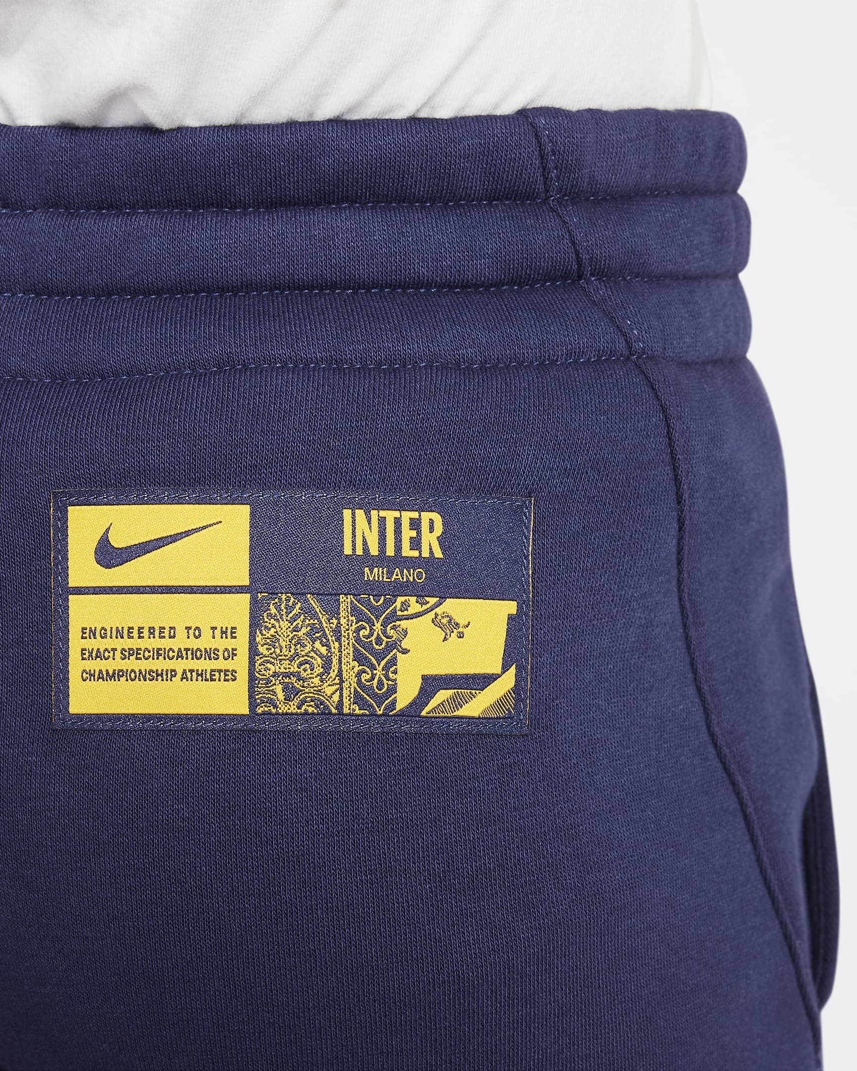 Joggery piłkarskie dla dużych dzieci (chłopców) Nike Inter Mediolan Club Fleece (wersja trzecia) - Blackened Blue/University Gold