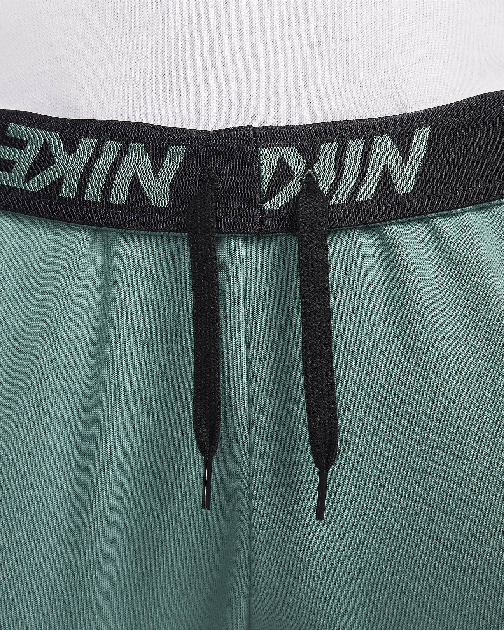Pantaloni fitness Dri-FIT affusolati Nike Dry Graphic – Uomo - Bicoastal/Nero