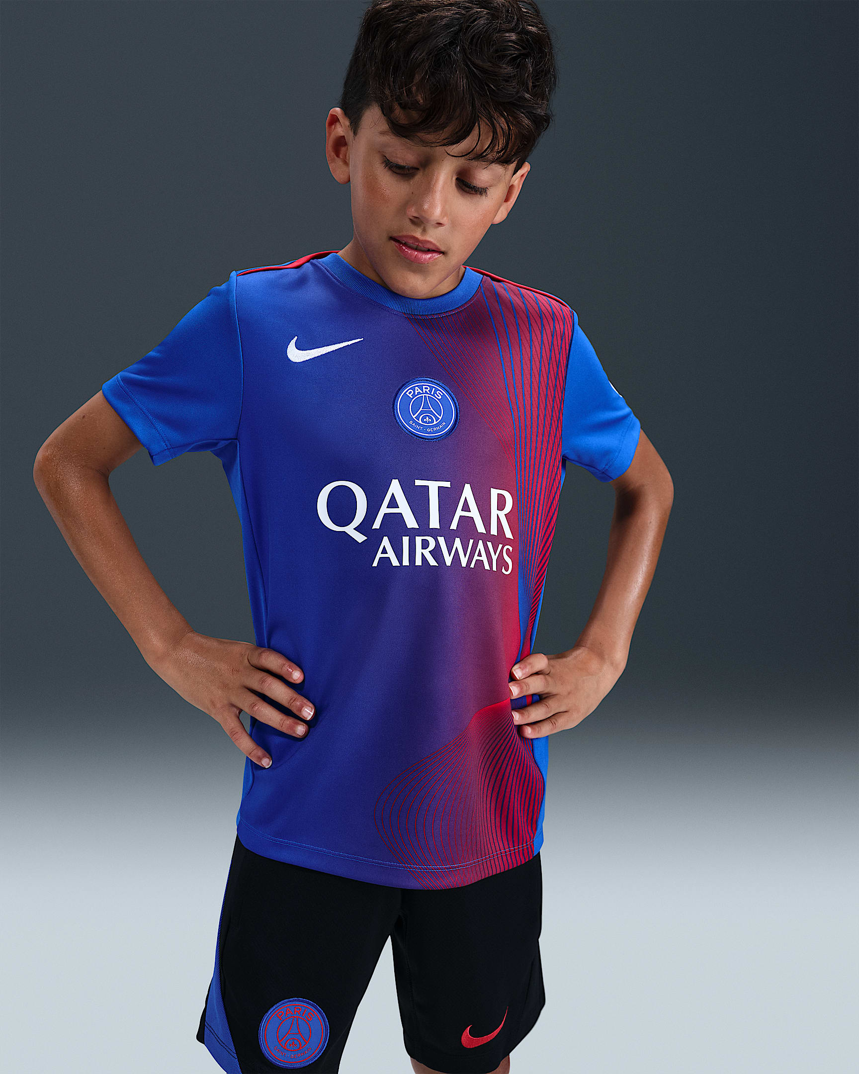 Paris Saint-Germain Academy Pro Third Older Kids' Nike Dri-FIT Football Pre-Match Top - Hyper Royal/Global Red/White