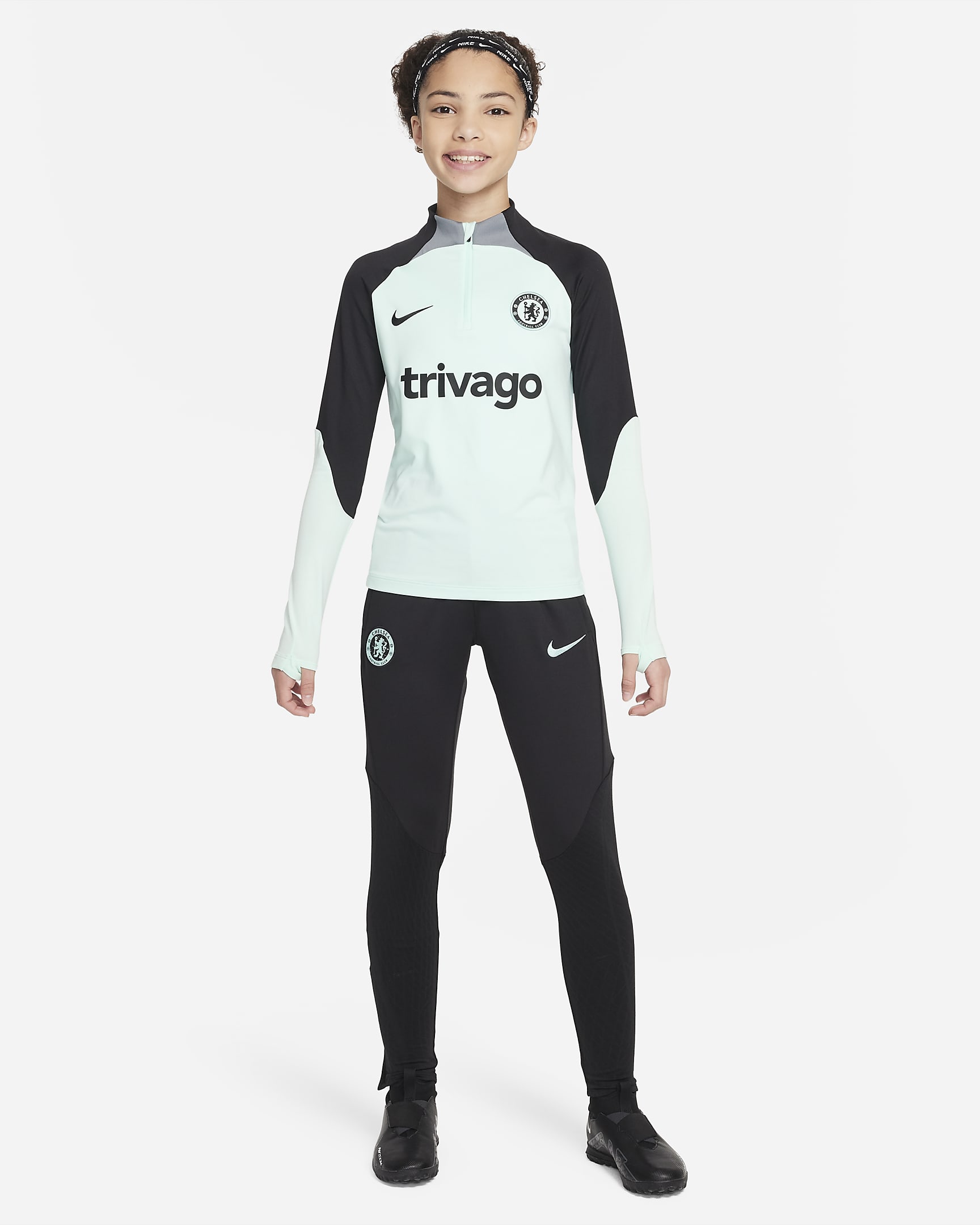 Dzianinowe spodnie piłkarskie dla dużych dzieci Nike Dri-FIT Chelsea F.C. Strike (wersja trzecia) - Czerń/Mint Foam