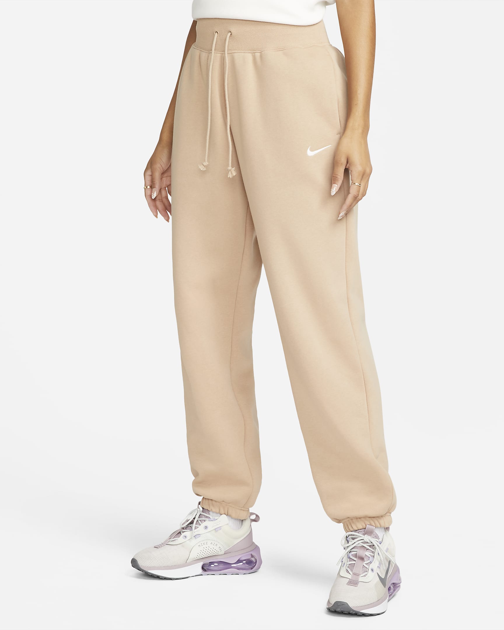 Calças de fato de treino folgadas de cintura subida Nike Sportswear Phoenix Fleece para mulher - Hemp/Sail