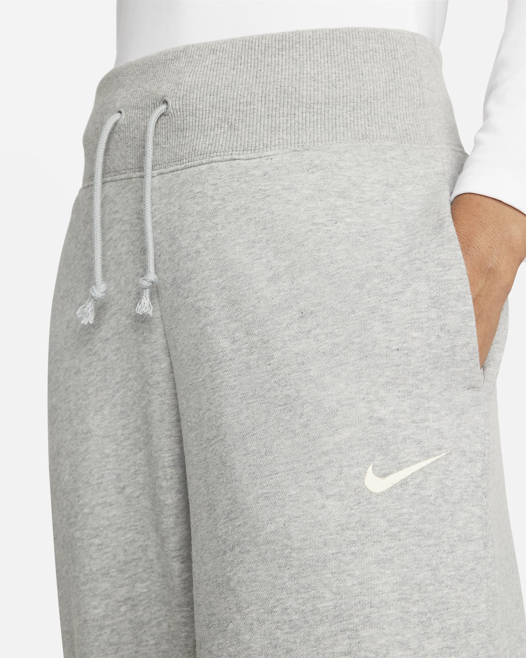 Calças de fato de treino a 7/8 delineadas de cintura subida Nike Sportswear Phoenix Fleece para mulher - Cinzento Heather escuro/Sail