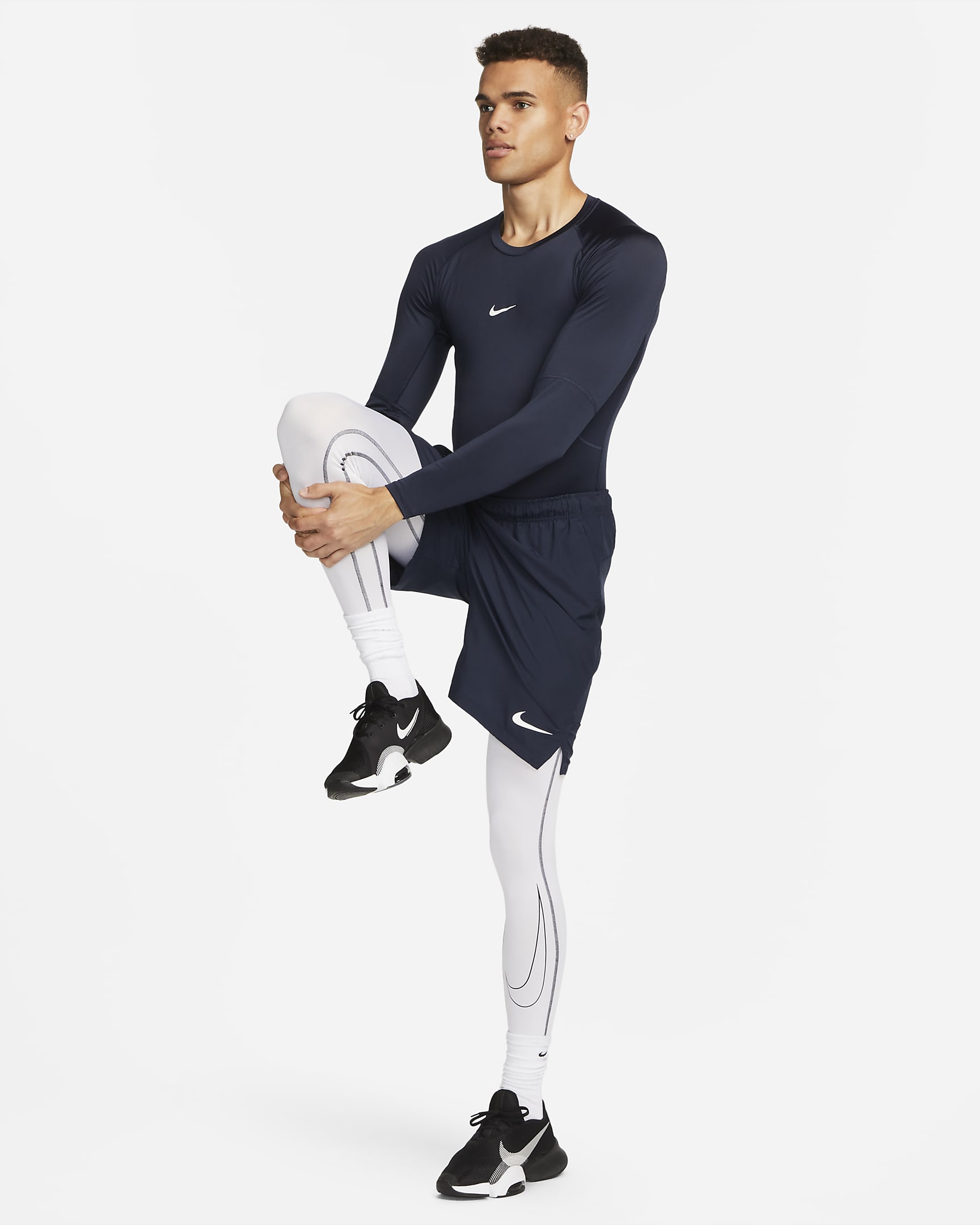 Nike Pro Dri-FIT tettsittende, langermet treningsoverdel til herre - Obsidian/Hvit