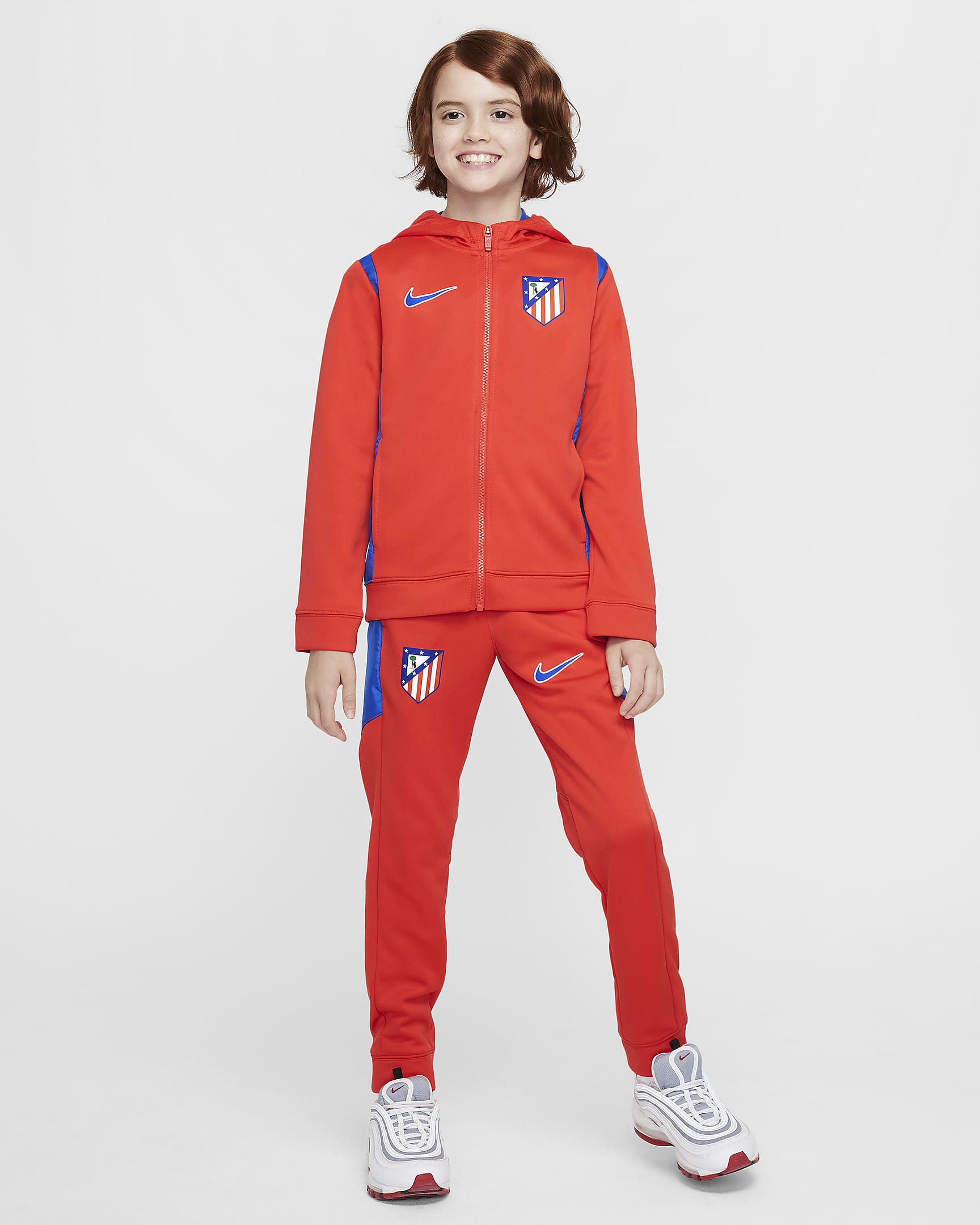 Atlético Madrid Home Older Kids' Nike Football Woven Tracksuit - Light Crimson/Game Royal/Game Royal