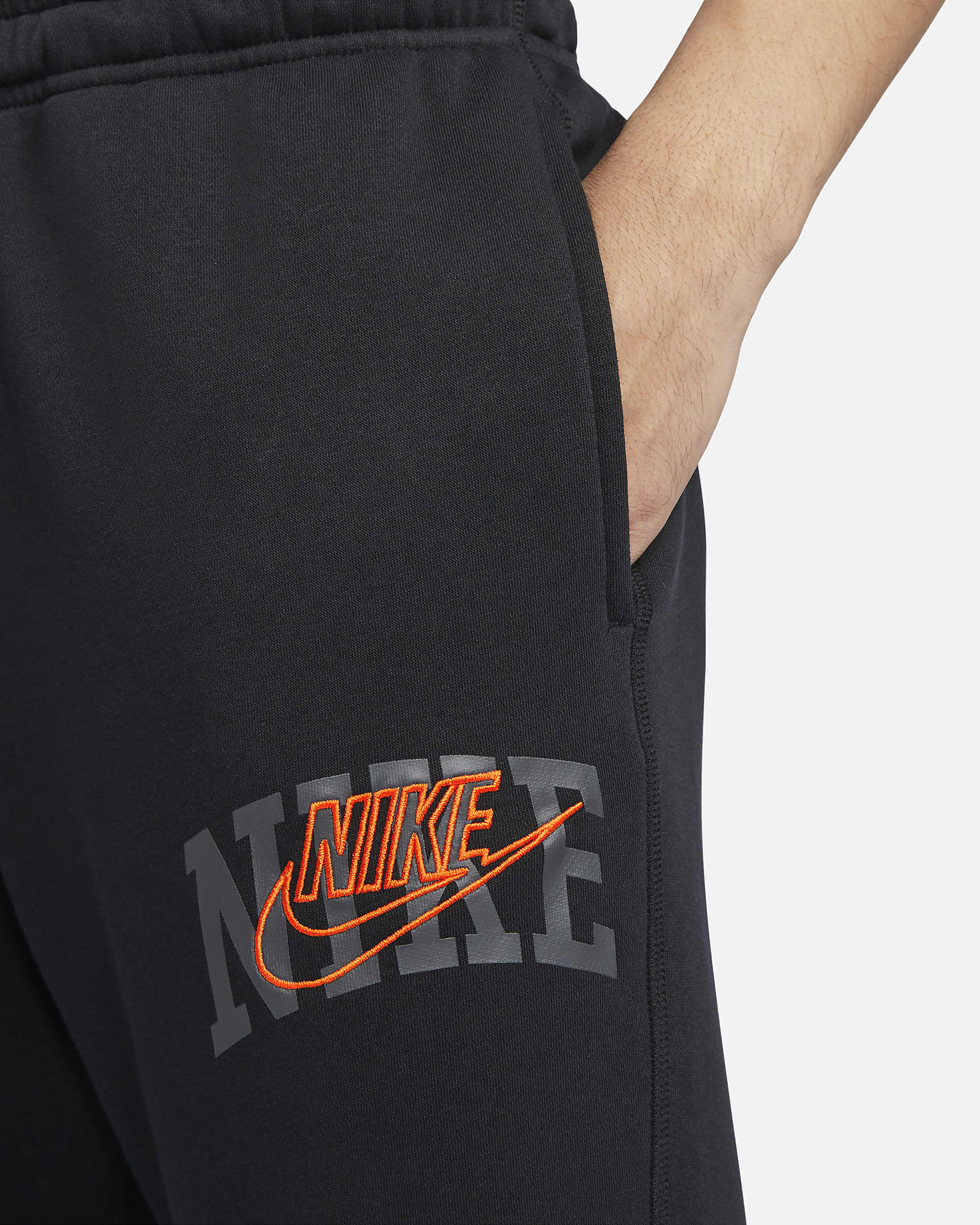 Nike Club Fleece Men's Cuffed Pants - Black/Safety Orange