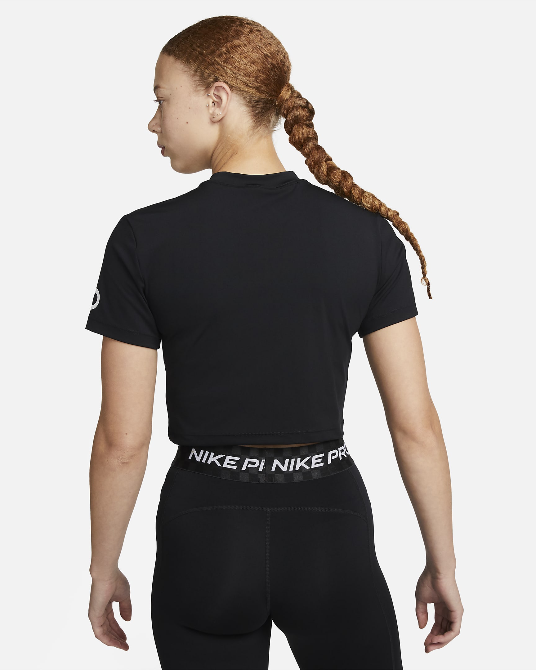 Kortärmad, kort träningströja Nike Pro Dri-FIT med tryck för kvinnor - Svart/Vit