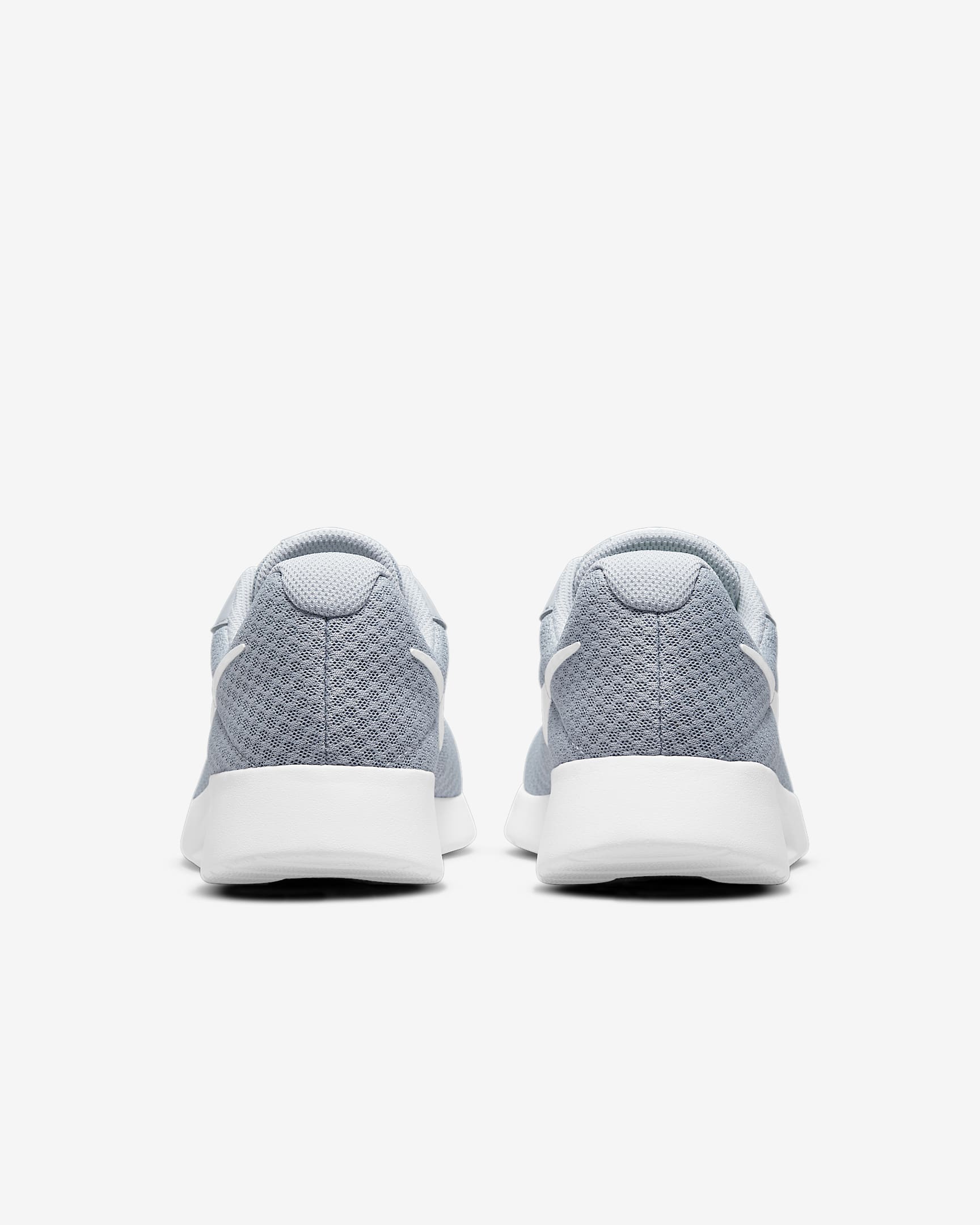 nike tanjun arch support