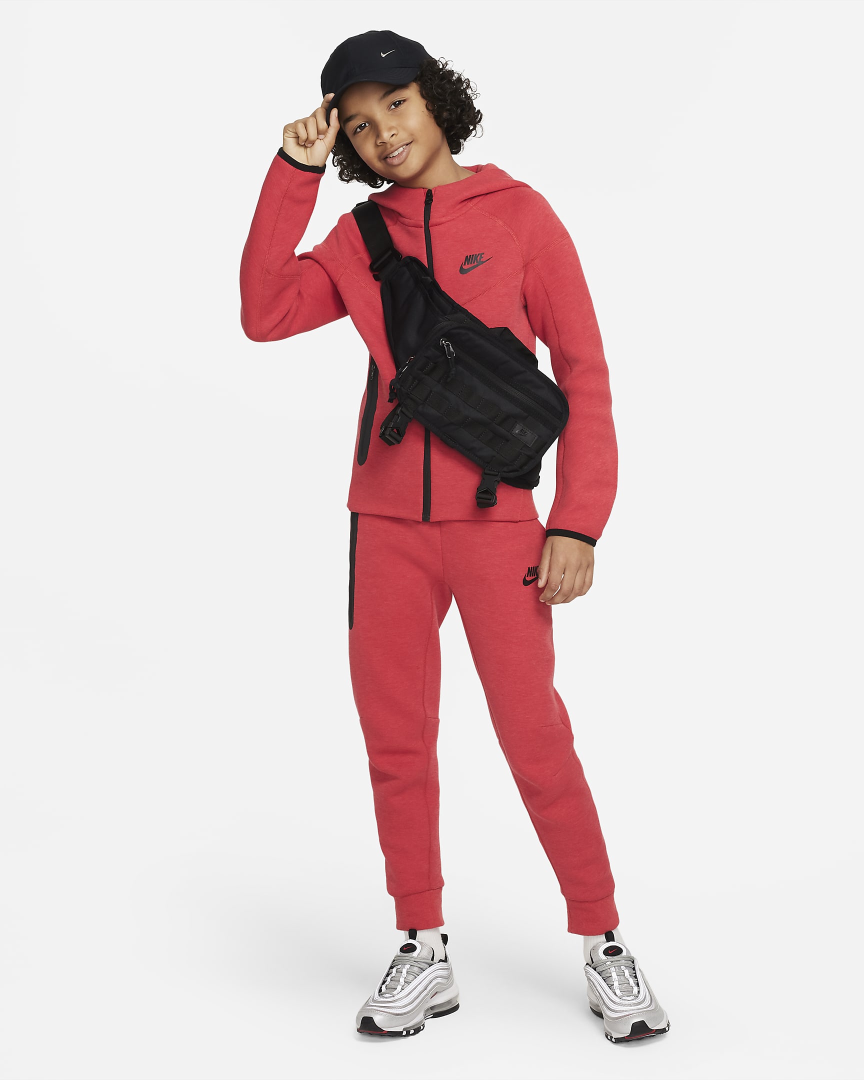 Tepláky Nike Sportswear Tech Fleece pro větší děti (chlapce) - Light University Red Heather/Černá/Černá