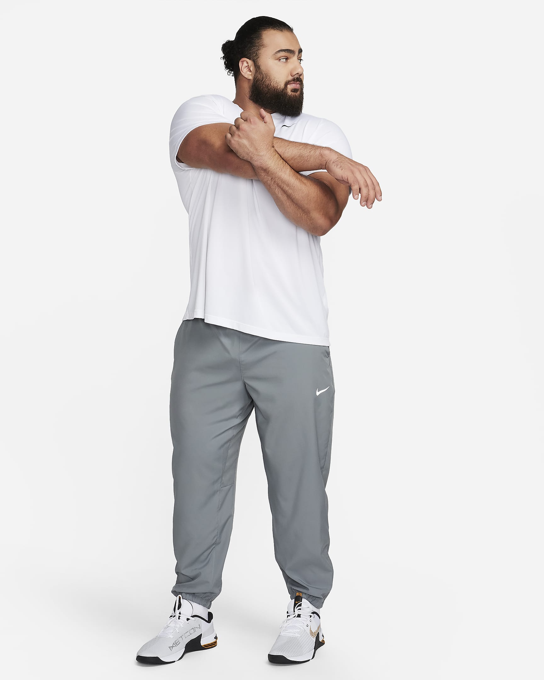 Pants Dri-FIT entallados versátiles para hombre Nike Form - Gris humo/Negro