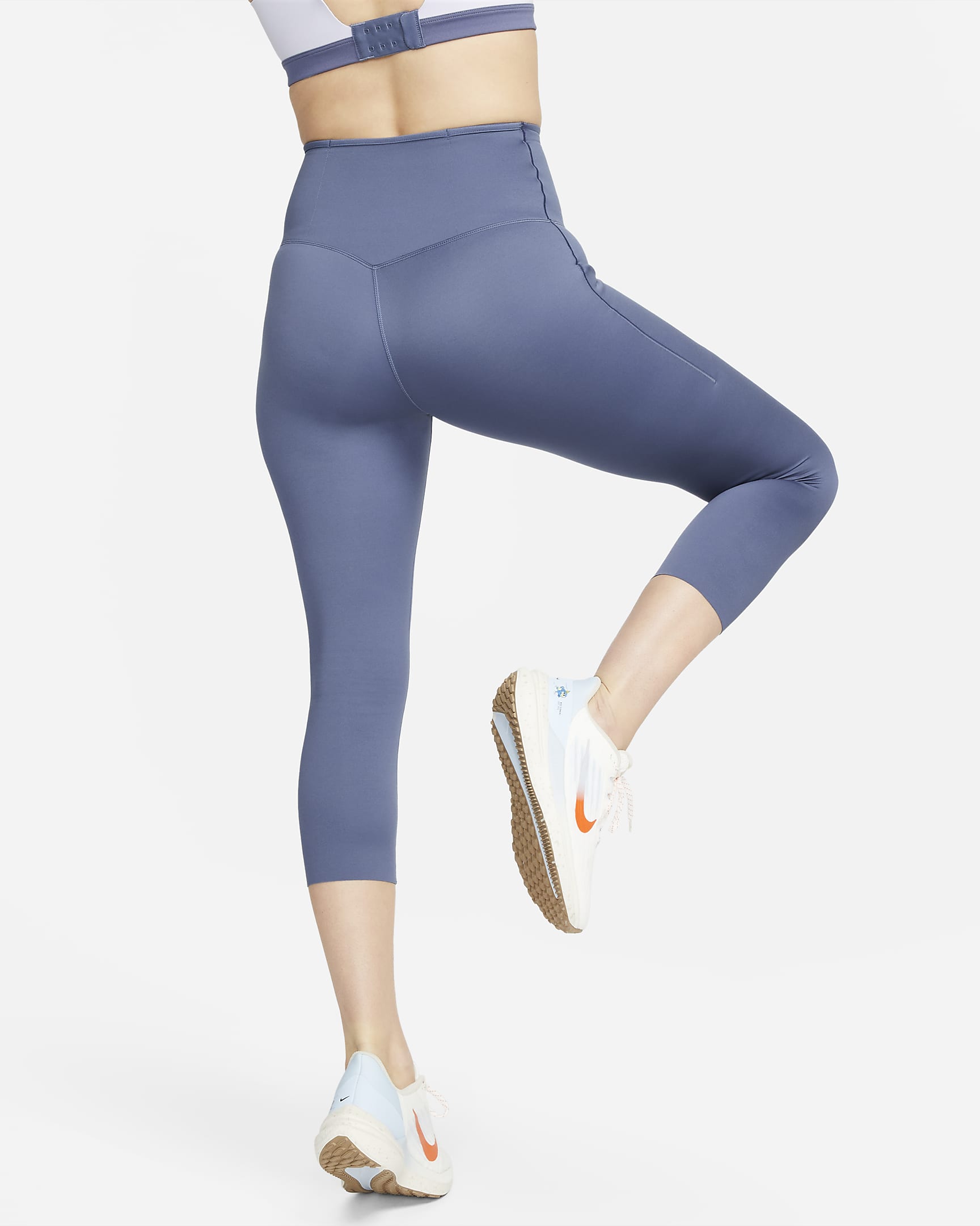 Leggings cropped de tiro alto y sujeción firme con bolsillos para mujer Nike Go - Azul difuso/Negro