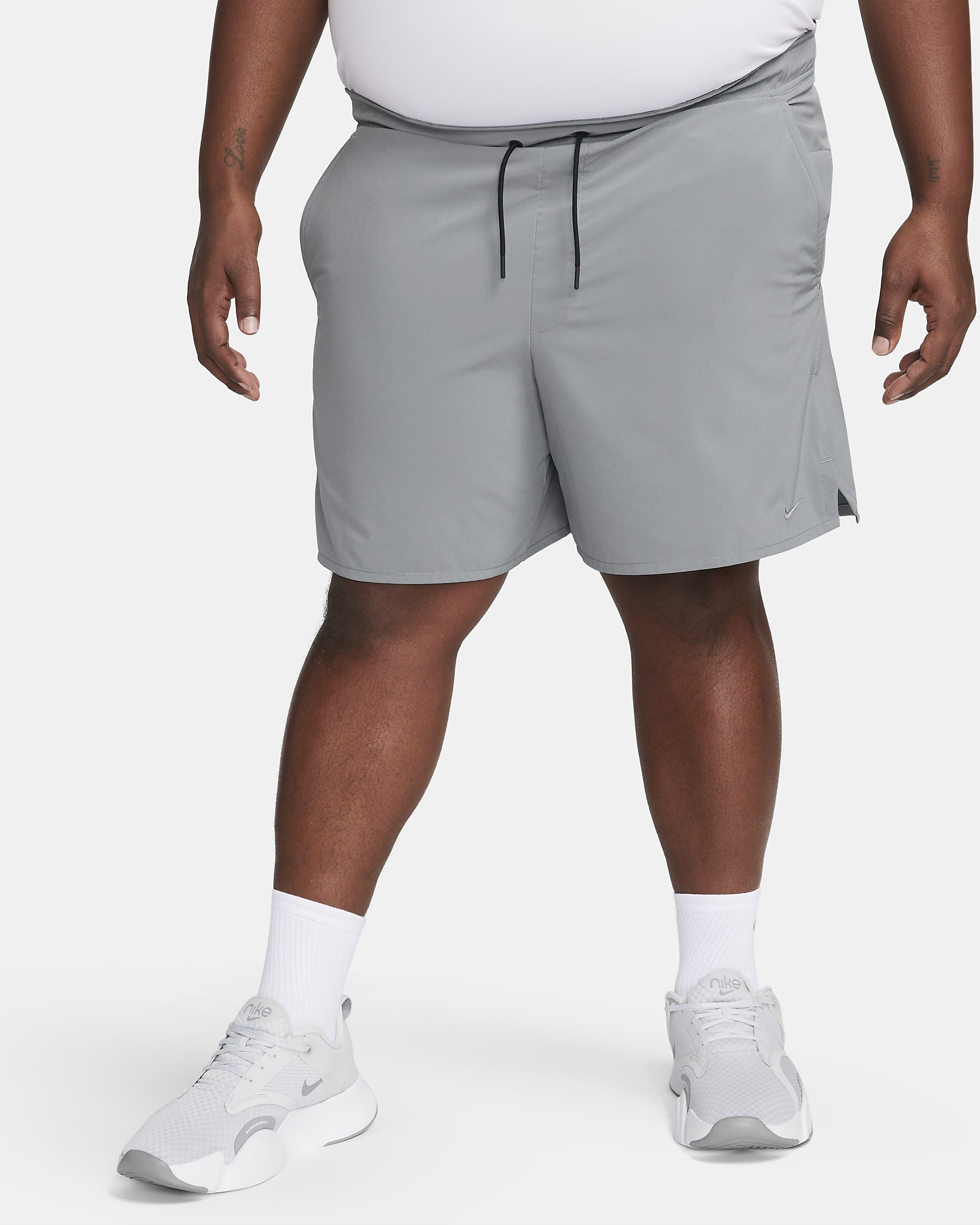 Nike Unlimited multifunctionele niet-gevoerde herenshorts met Dri-FIT (18 cm) - Smoke Grey/Zwart/Smoke Grey