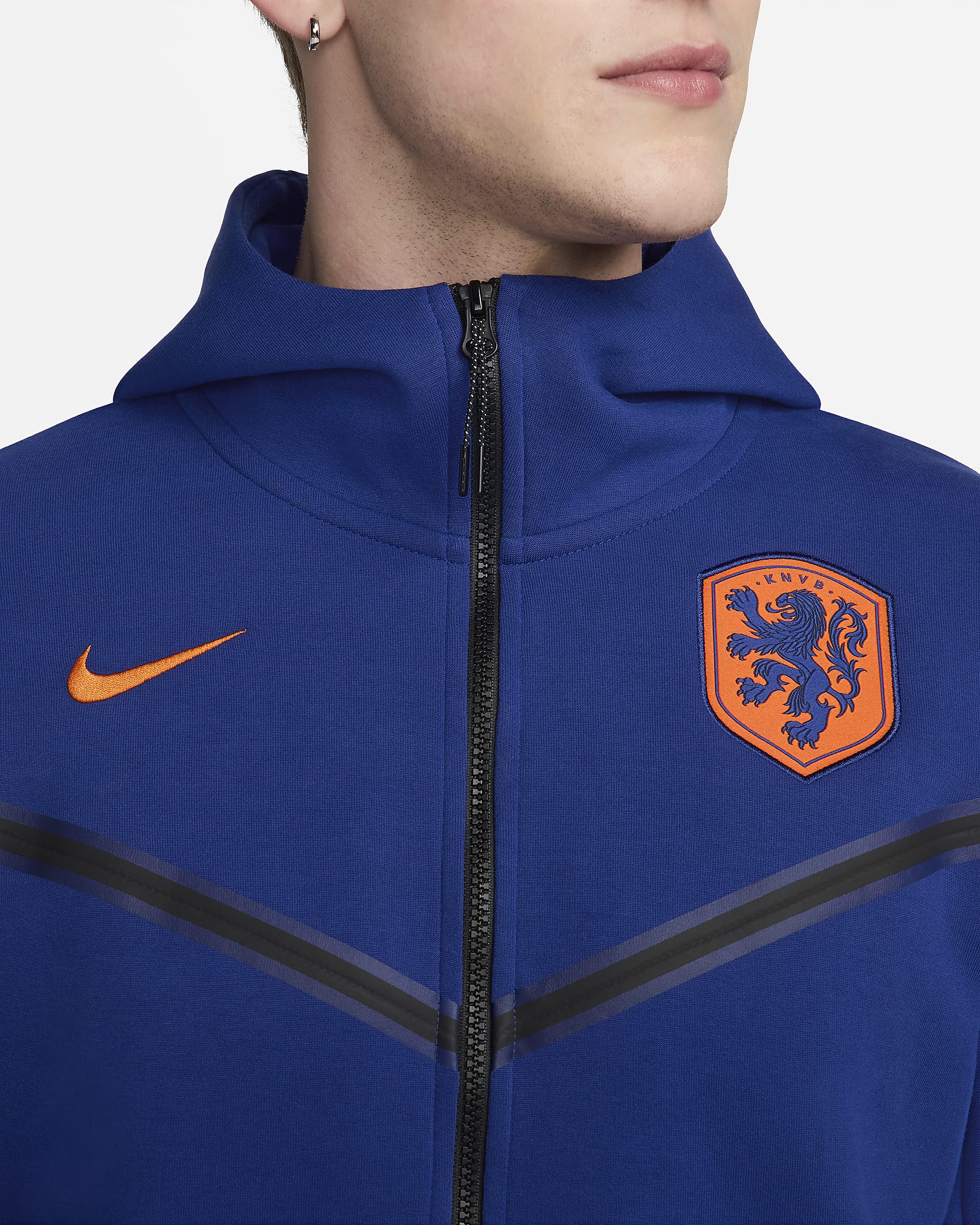 Pánská fotbalová mikina Nike Nizozemsko Tech Fleece Windrunner s kapucí a zipem po celé délce - Deep Royal Blue/Safety Orange