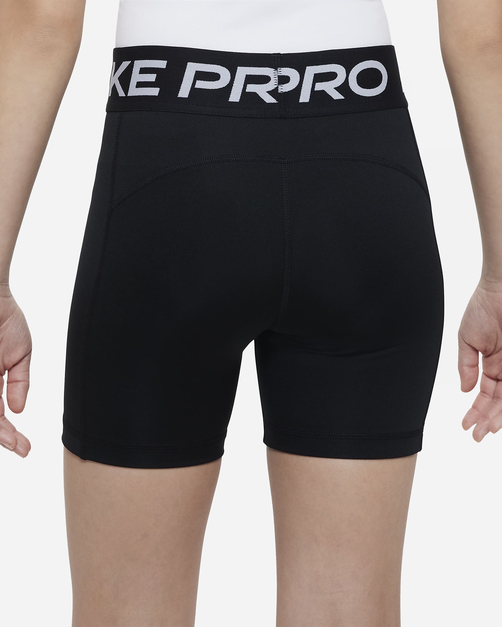 Nike Pro Dri-FIT shorts (13 cm) til store barn (jente) - Svart/Hvit