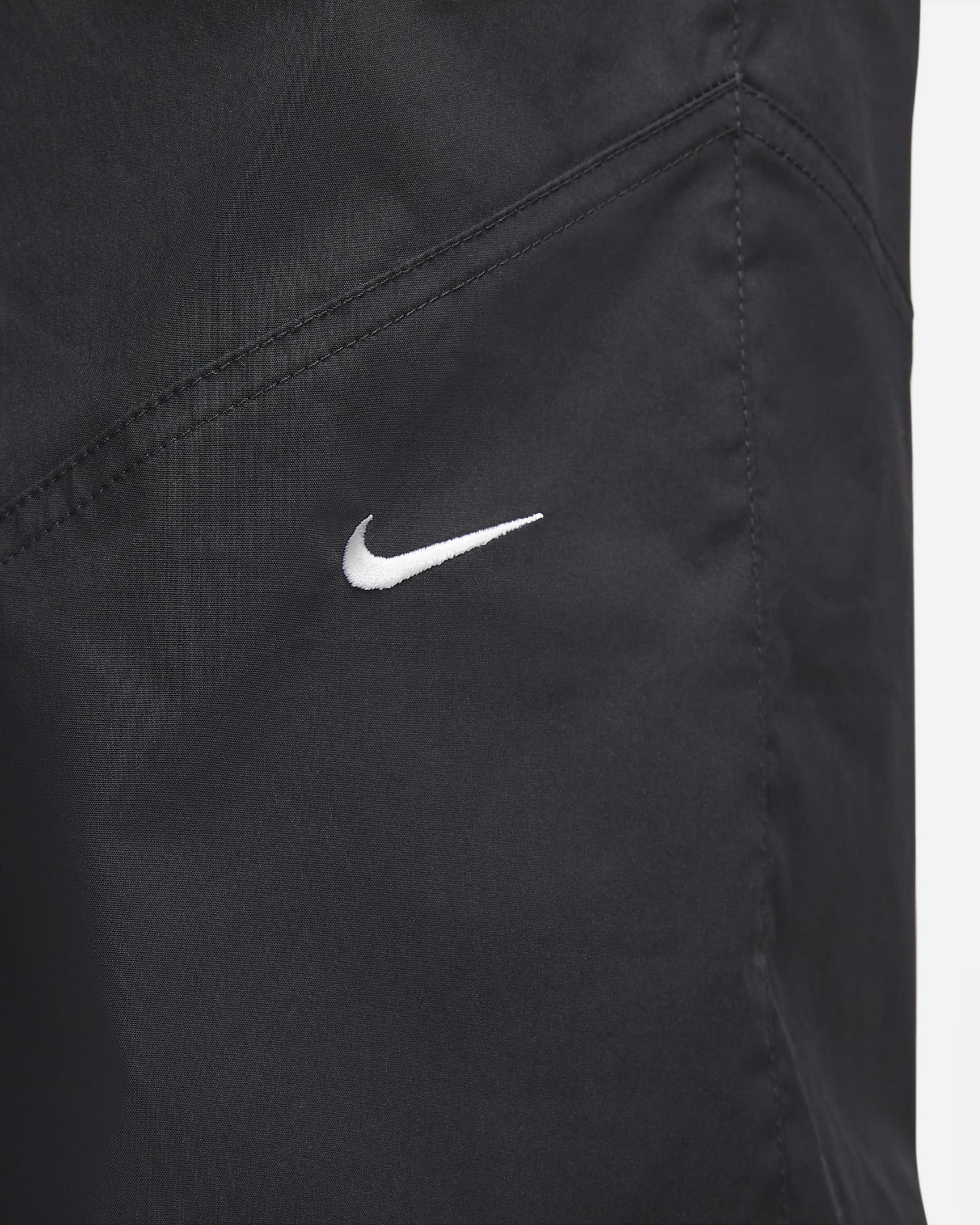 Pantaloni in tessuto a vita alta Nike Sportswear Essentials– Donna - Nero/Bianco